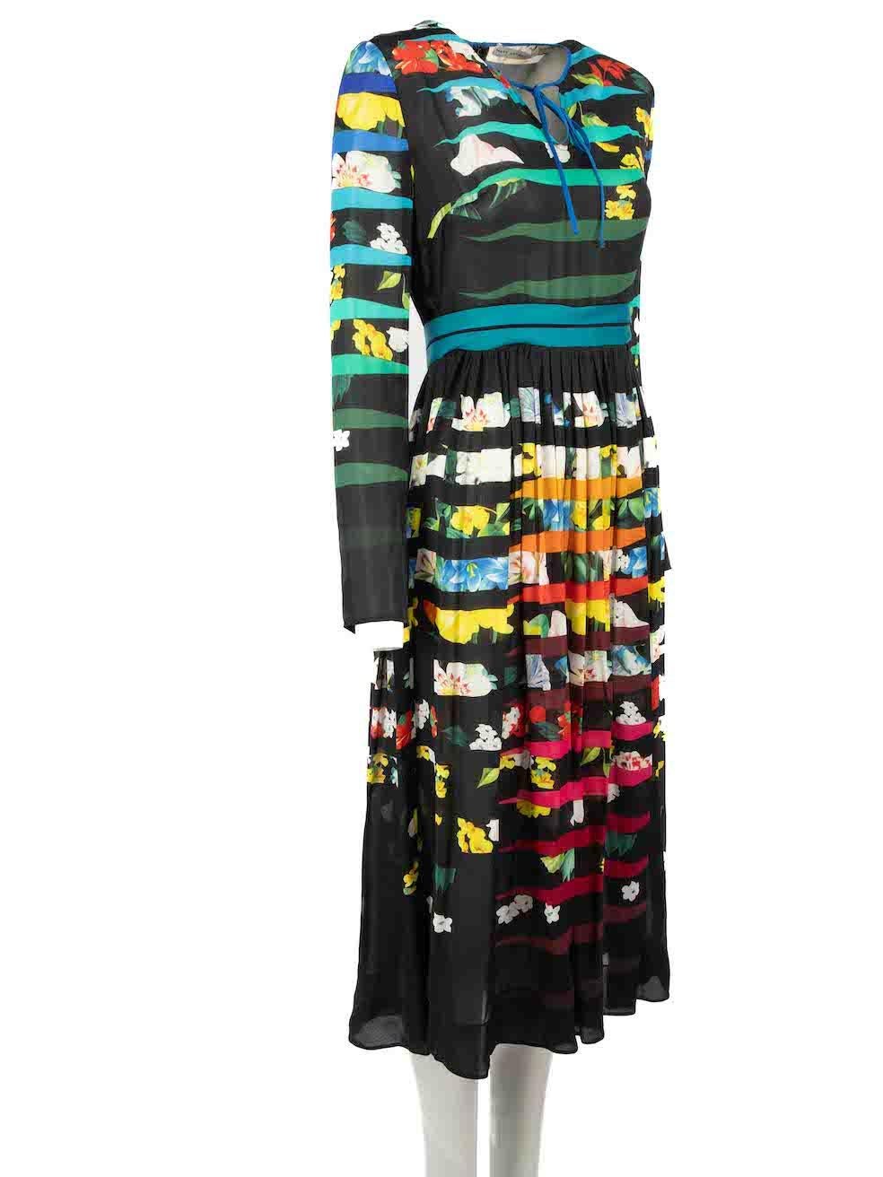 CONDITION is Good. General wear to dress is evident. Moderate signs of wear to the weave of the silk with pulls all over on this used Mary Katrantzou designer resale item. 
 
Details
Multicolour
Silk
Maxi dress
Sheer
Rainbow striped floral pattern
V