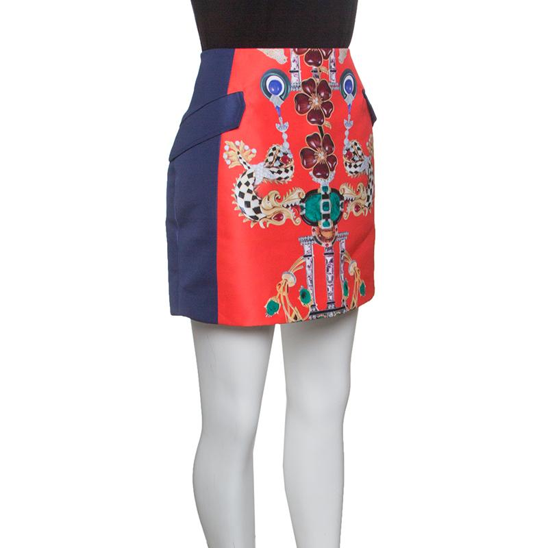 How stylish is this mini skirt from Mary Katrantzou! Tailored from quality fabrics, the skirt carries colourful prints on the front and a zipper at the back. You can team it with a simple top and flats or high heels.

