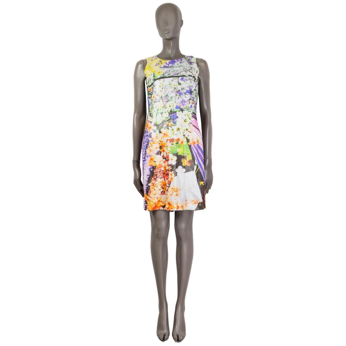 100% authentic Mary Katrantzou sleeveless floral print shift dress in multi-color viscose blend (assumed as tag is missing) with a round neck. Has a metallic-like shimmer. Closes on the back with a zipper. Lined in viscose blend (assumed as tag is