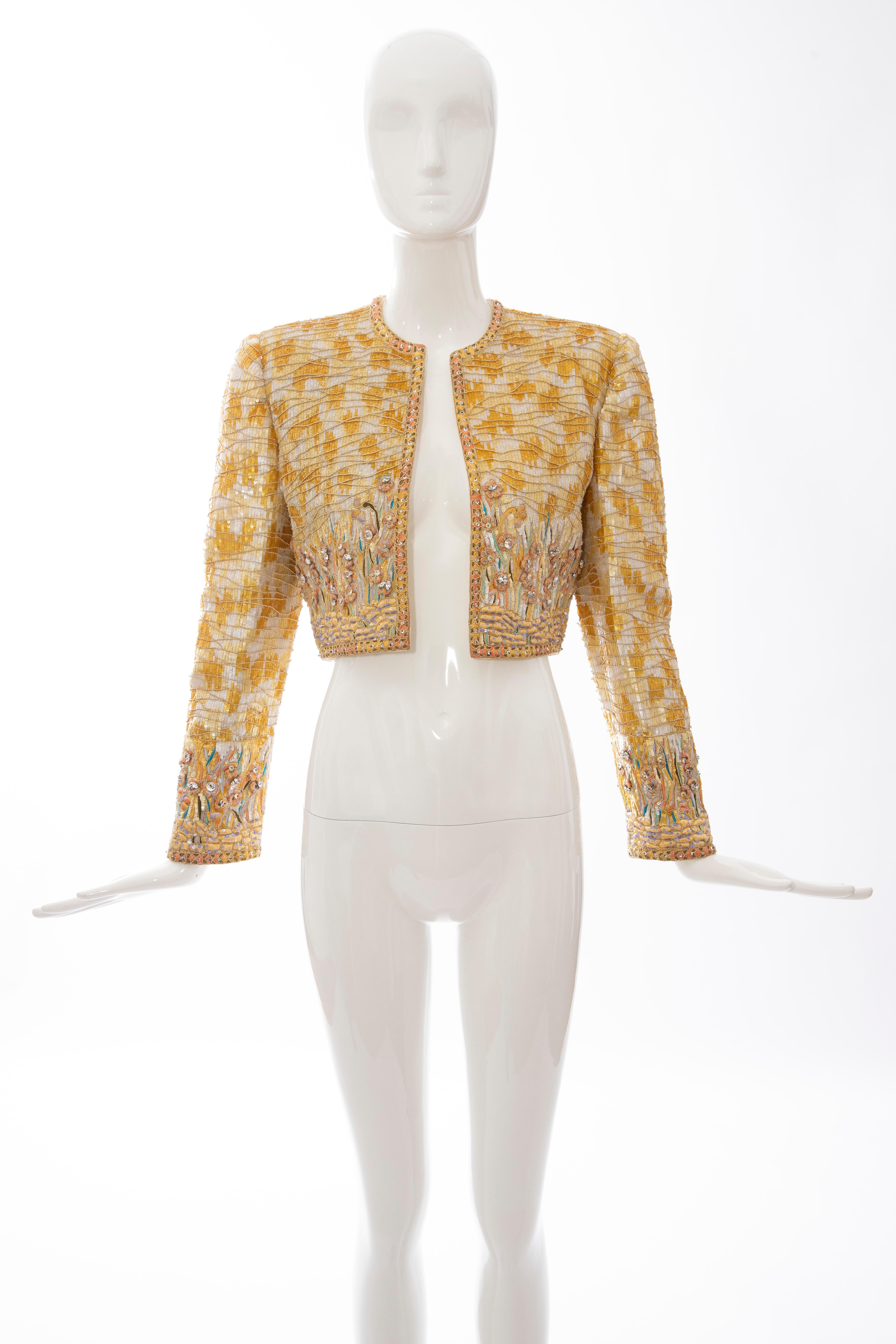 Mary McFadden Couture silk open front embroidered sequins diamanté evening bolero jacket with padded shoulders and fully lined in silk.

US.2
Bust: 36, Waist: 32, Shoulder: 15, Length: 16.5, Sleeve: 27

Fabric: 100% Silk