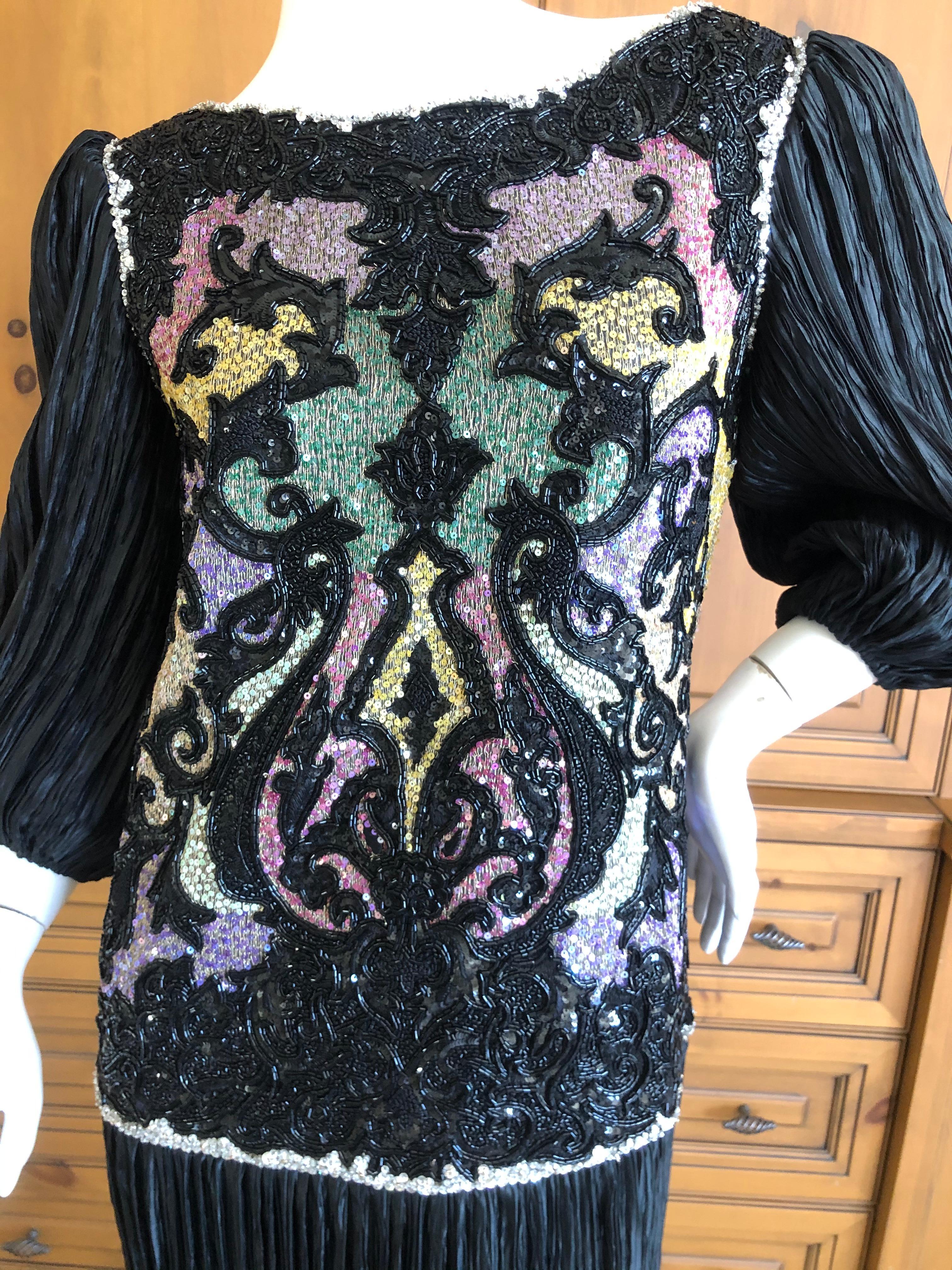 Mary McFadden Couture Embellished Evening Dress
Richly embroidered and embellished, this is such a beautiful example of McFadden's talent.
Size 6 
Bust 36