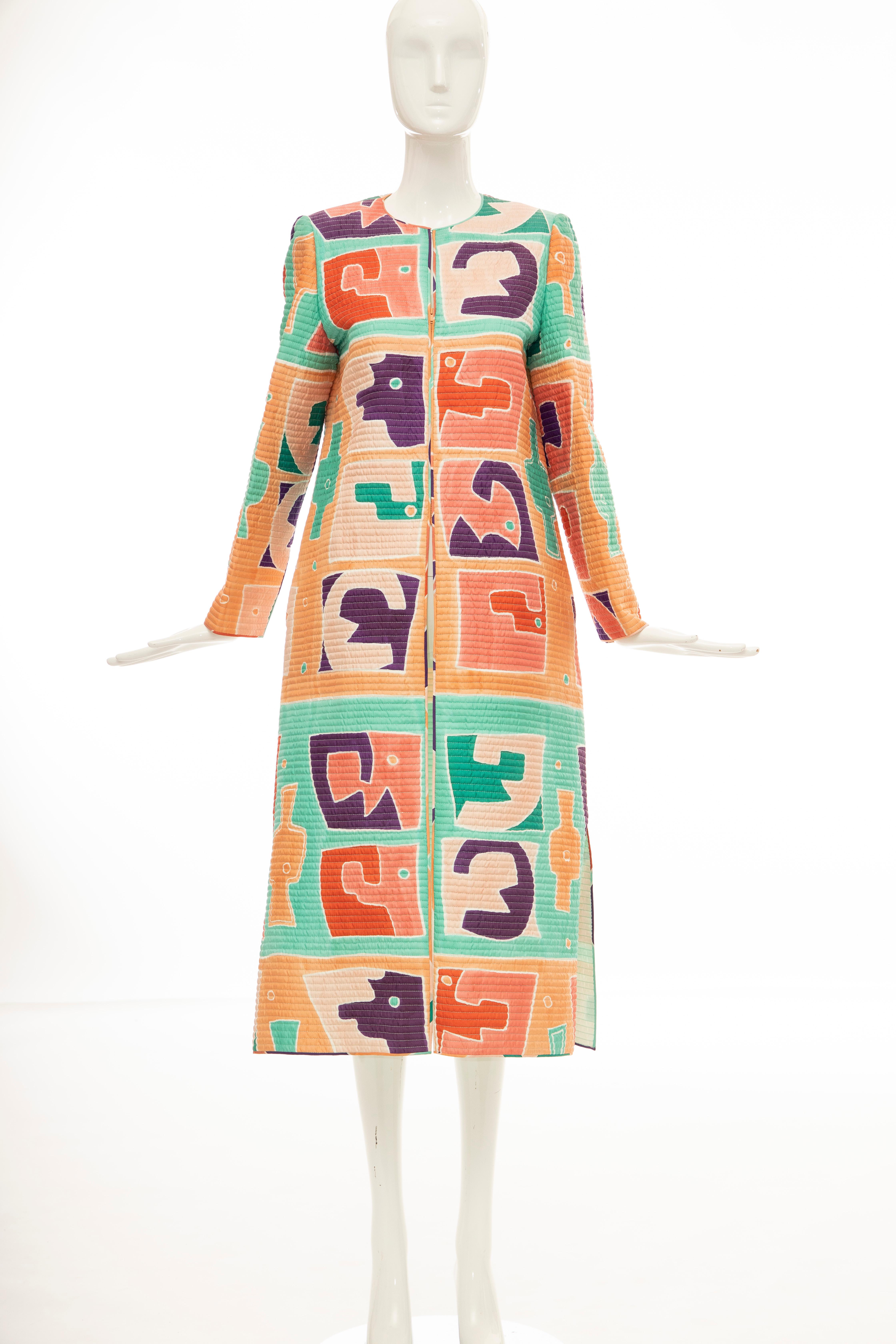 Mary McFadden, Circa: 1980's silk, lightweight, quilted and printed long coat with scoop neck, dual seam side pockets and zip and hook-and-eye closure at front. 

Includes original Henri Bendel tags. 

US. 10

Bust: 39, Waist: 39, Shoulder: 14,