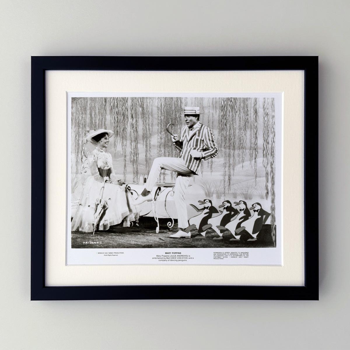 Original 8x10 inches Publicity Still for the Disney classic Mary Poppins (1964) starring Julie Andrews (Mary Poppins) and Dick Can Dyke (Bert).

Publicity (film/production) stills were created to help studios promote their new films. The stills were