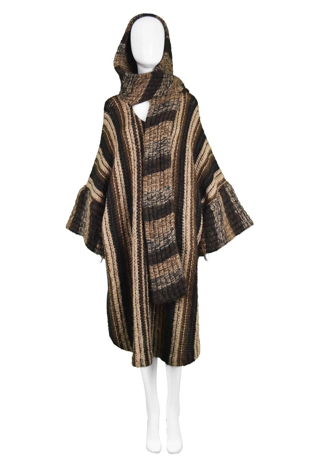Mary Quant Vintage 1970s Brown Avant Garde Knit Hood Dress with Scarf Detail

Size: Marked L but will fit most due to loose, oversized fit.
Bust - Free
Waist - Free
Hips - Free
Length (Shoulder to Hem) - 38” / 96cm
Shoulder to Shoulder - 25” /