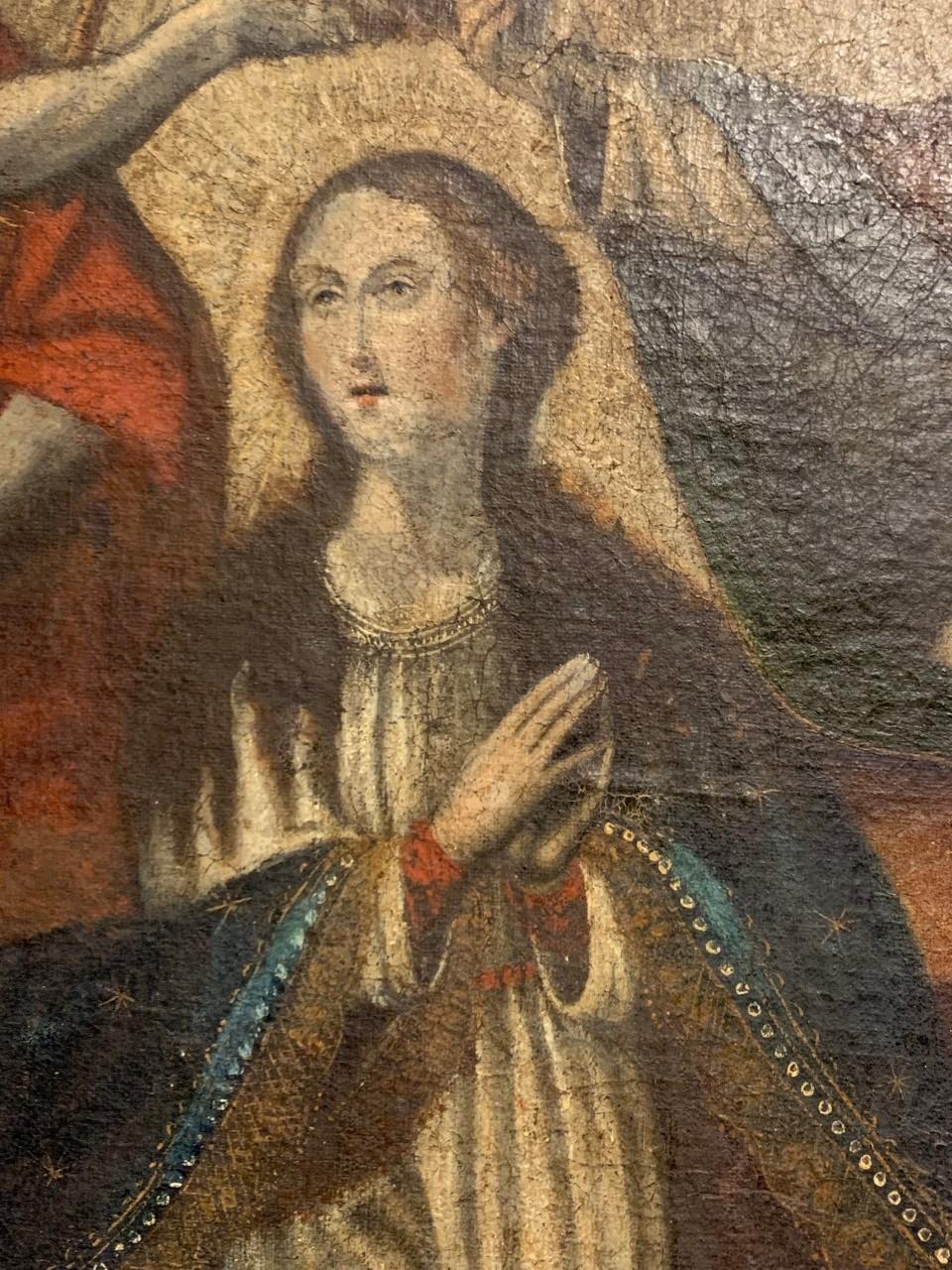 This exquisite early 18th-century Spanish Colonial oil painting, originating from Bolivia, portrays “Mary, Queen of Heaven.” With meticulous craftsmanship, it illustrates the Coronation of the Virgin Mary, a significant theme in Catholic