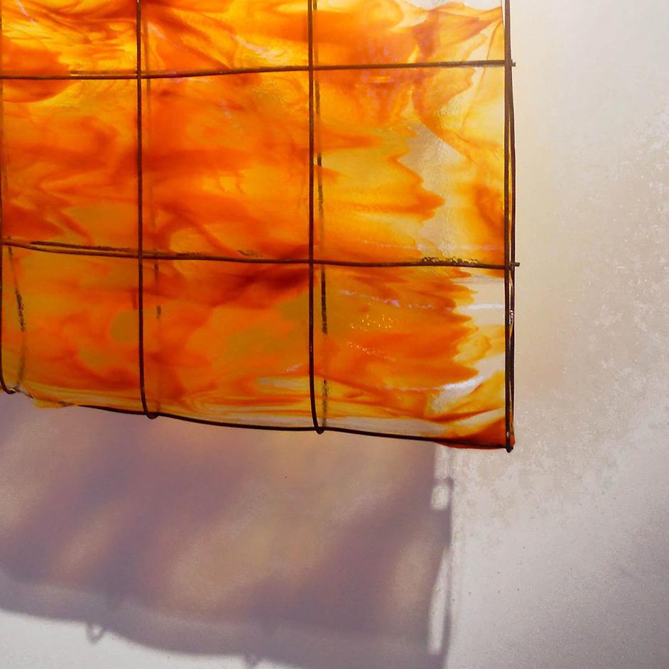 Shaffer was inspired by seeing sunsets reflecting in windows when she lived in Santa Fe, New Mexico to create this Window Series. Shaffer is a risk taker, as is apparent in the extremely thin sheet of hand-crafted sheet glass in this particular