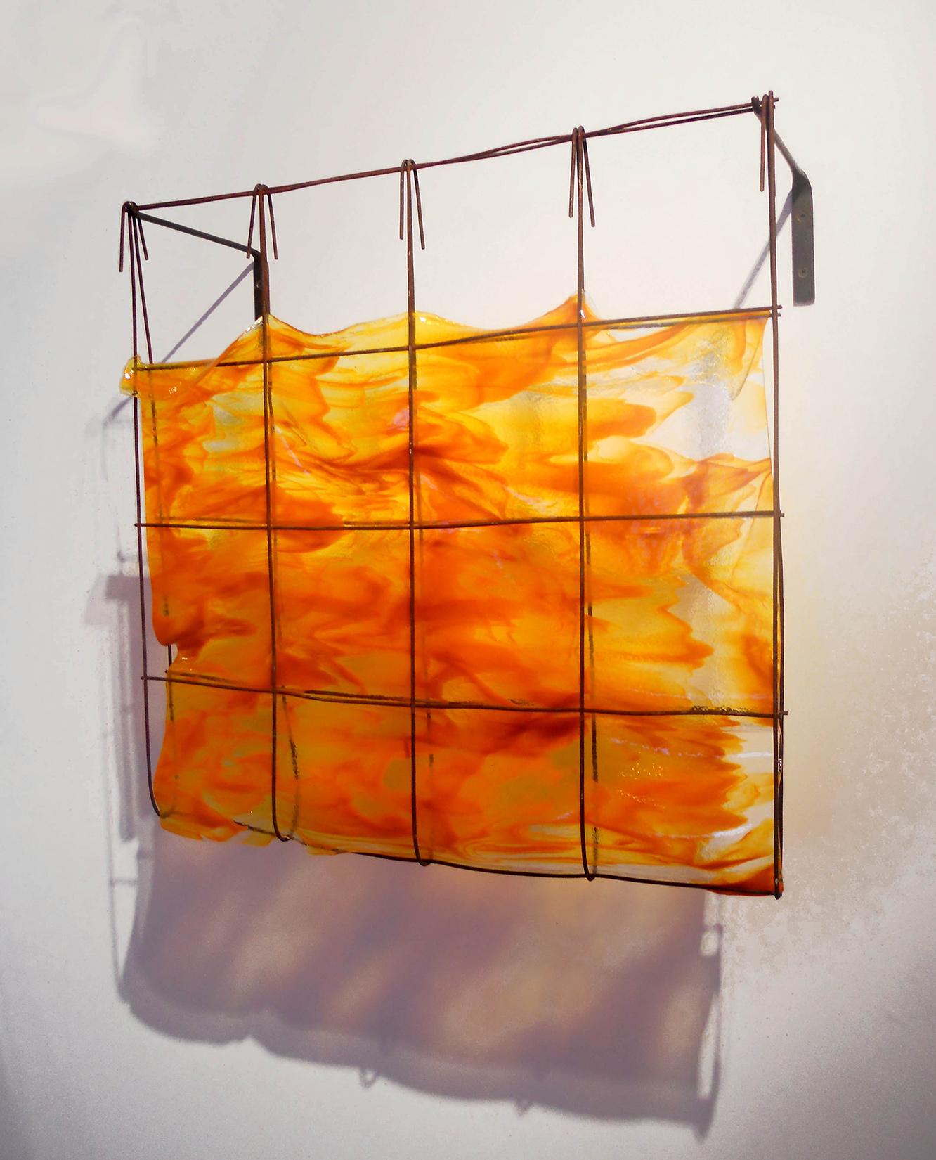 Southern Sunset, a glass and metal orange wall sculpture by Mary Shaffer 