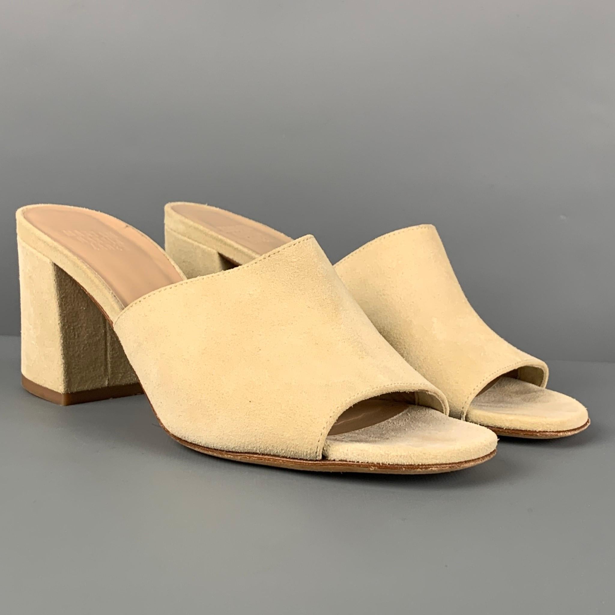 MARYAM NASSIR ZADER sandals comes in a beige suede featuring a peep toe and a chunky heel. Made in Italy.

Very Good Pre-Owned Condition.
Marked: 37
Original Retail Price: $440.00

Measurements:

Heel: 2.5 in.  