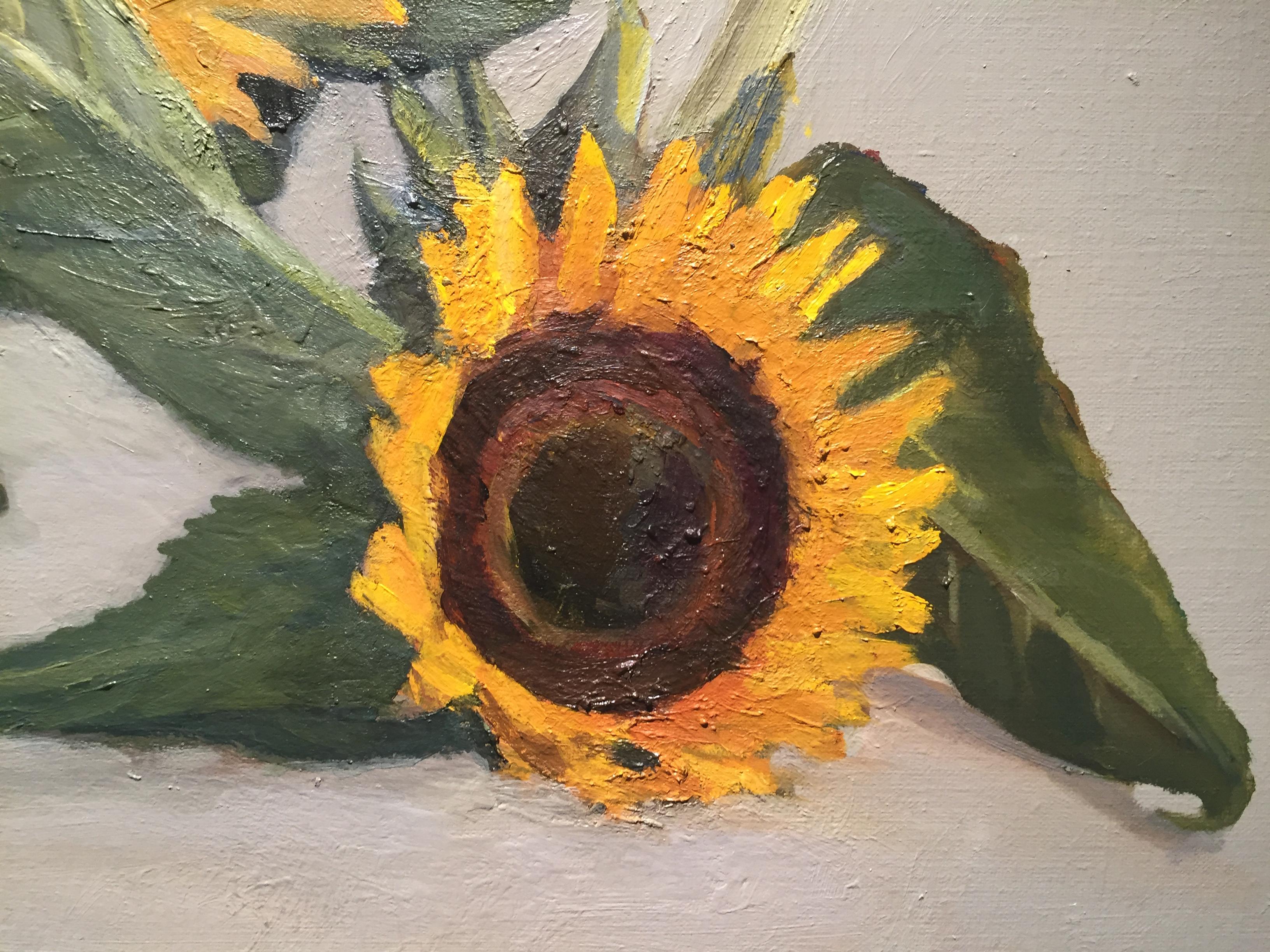 An oil painting of three sunflowers laid horizontally. Painted from life in the artists studio, in Sag Harbor, New York. 


Maryann Lucas lives and works in Sag Harbor. She is primarily self-taught but has also received instruction and support from