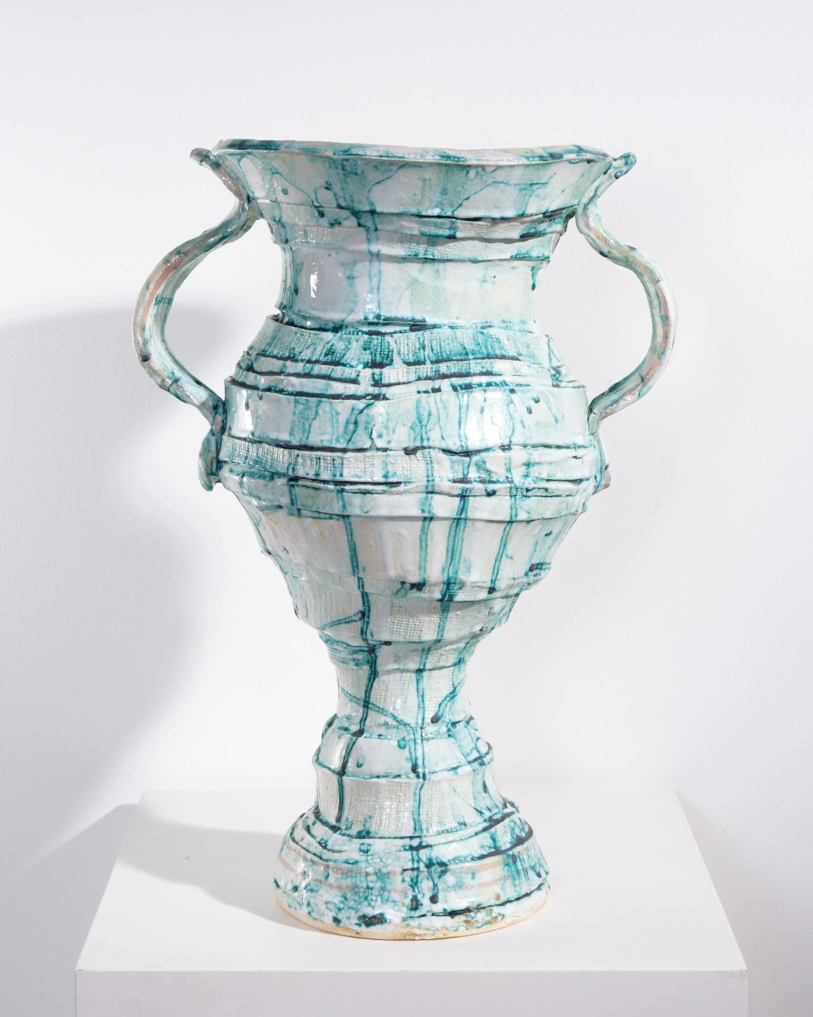 Green and white glaze
H48 x W24 cm 
With maker’s mark