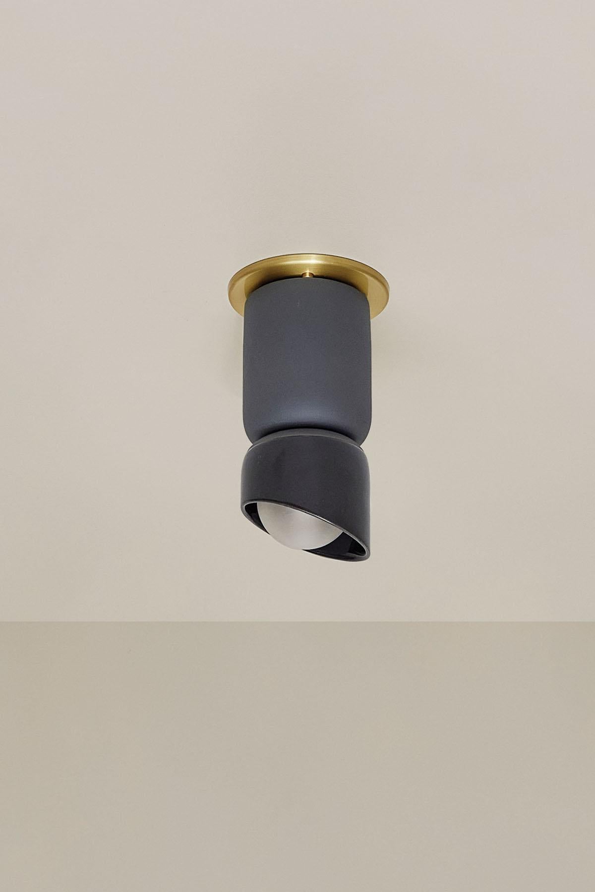 The Terra 1.5 Ceiling Light, Slim Base Adapter is a layered matte cylinder and glazed base which creates an asymmetric stack of ceramic forms with two contrasting finishes. Available in a choice of three natural tones – Slate, Sage, Vanilla Bean and