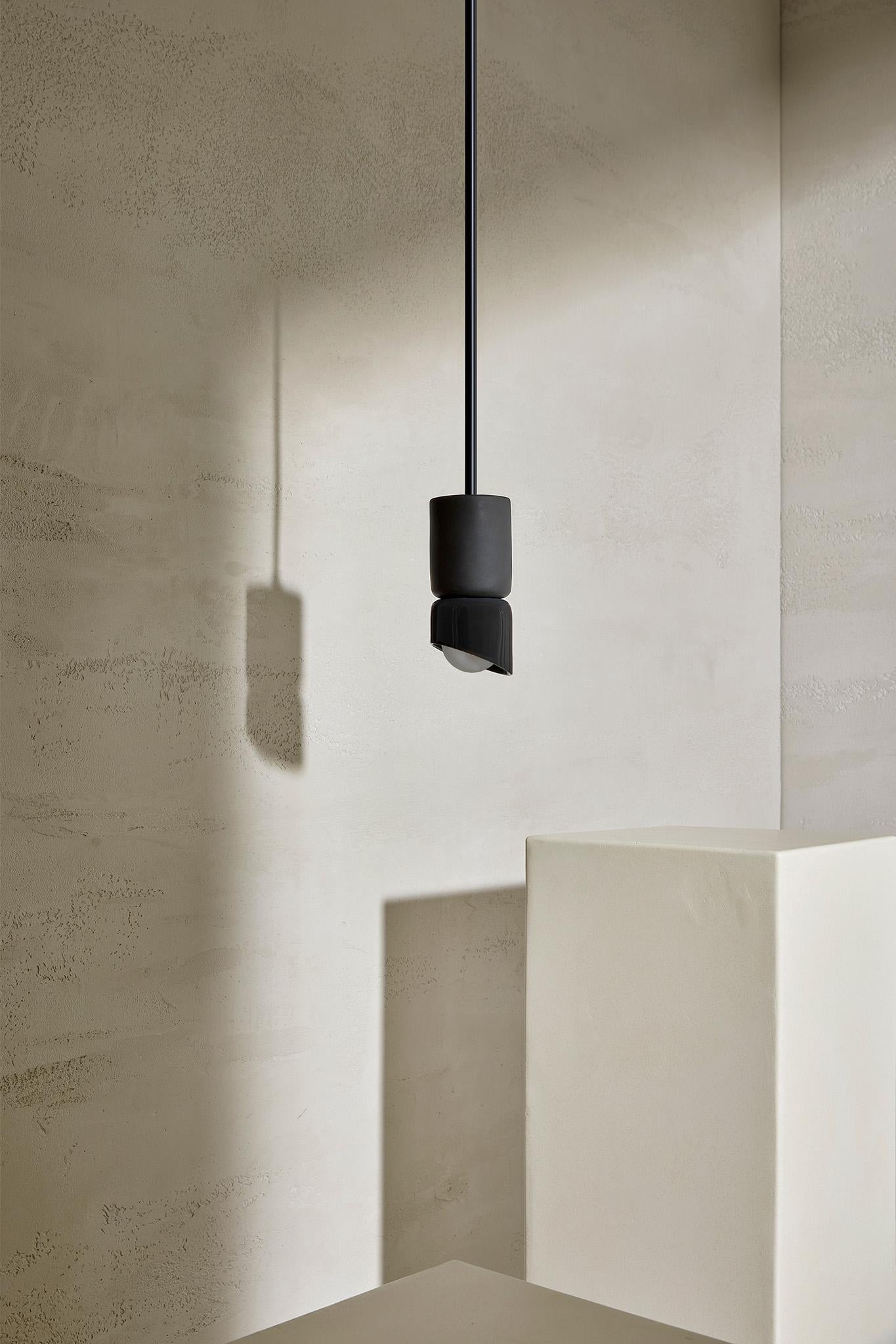 The Terra 1.5 Pendant Light is a layered matte cylinder and glazed base which creates an asymmetric stack of ceramic forms with two contrasting finishes. Available in a choice of three natural tones – Slate, Sage and Vanilla Bean, each component on