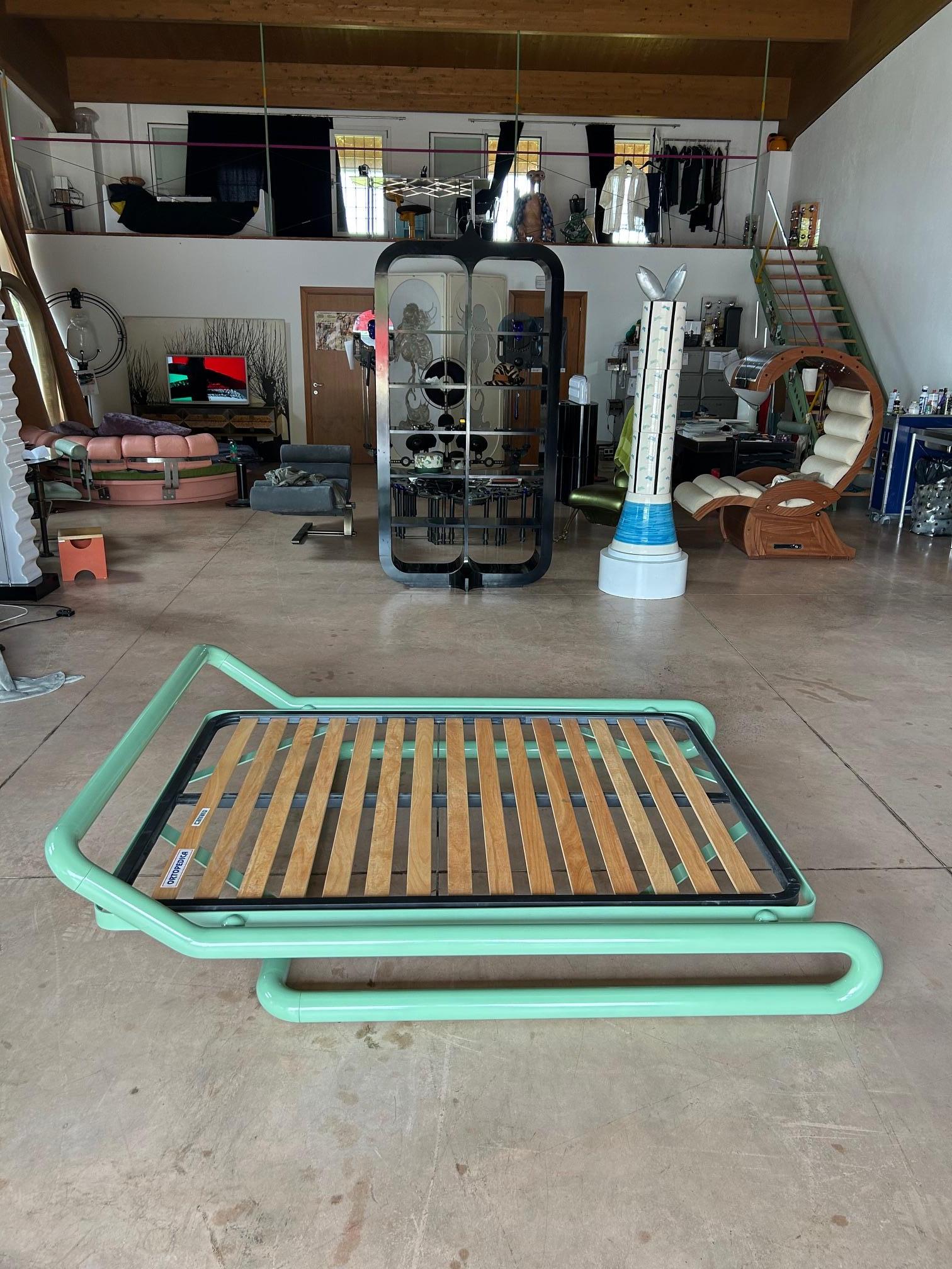 Rare green enamel cantilever french size bed frame by architect Marzio Cecchi (1940-1990) and produced by his design practice Studio Most.
Cecchi could be said to be a practitioner of 'total design'-from a building's structure to the objects in its