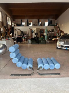 Marzio Cecchi floating Crossbow armchair with ottoman, Italy, 1970s