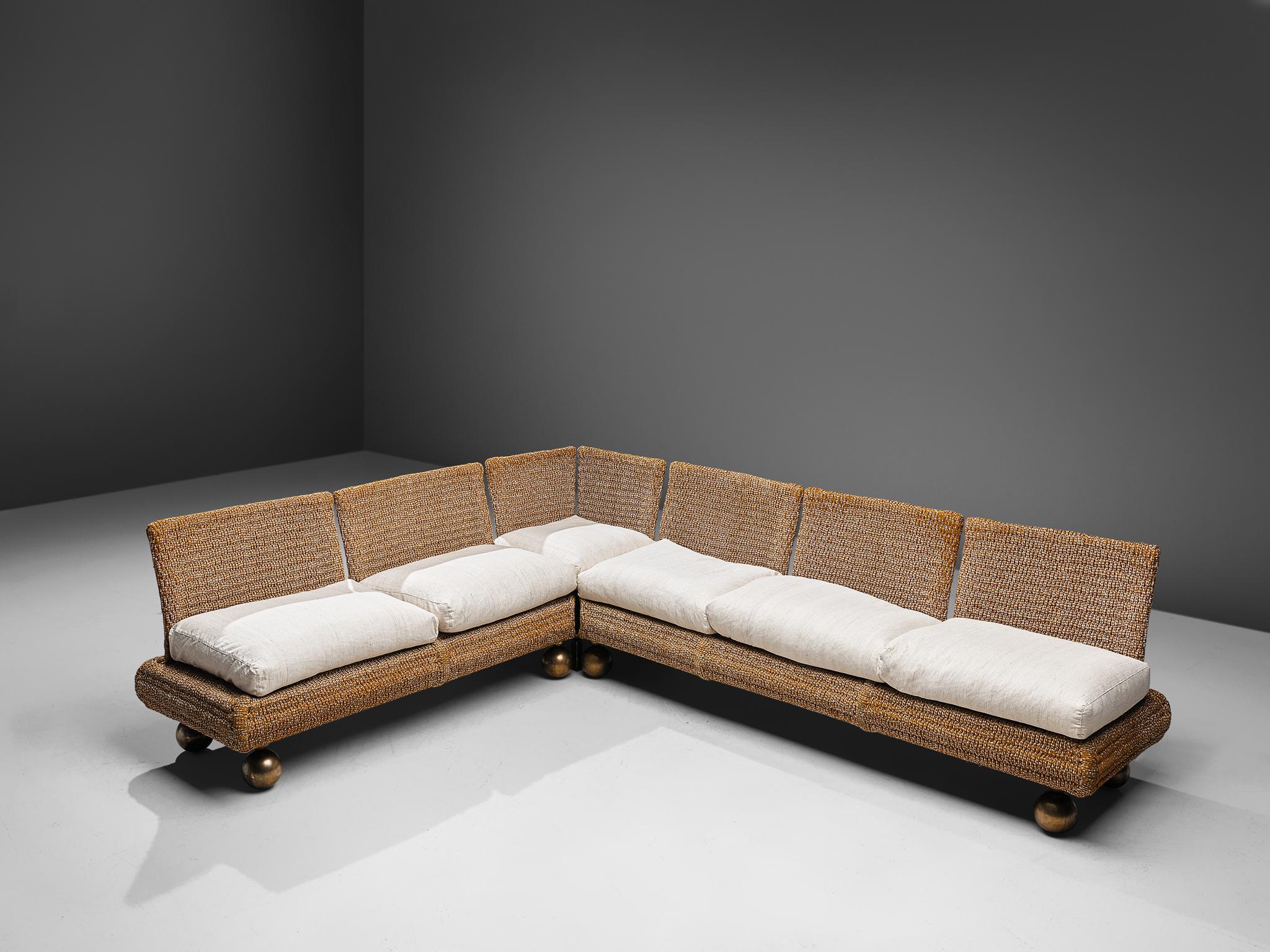 Marzio Cecchi for studio most, sectional sofa, metal, bronze, rope and upholstery, Italy, circa 1977

This large sectional sofa by Marzio Cecchi features an interesting design with a woven rope frame. It is separated in two parts, allowing the
