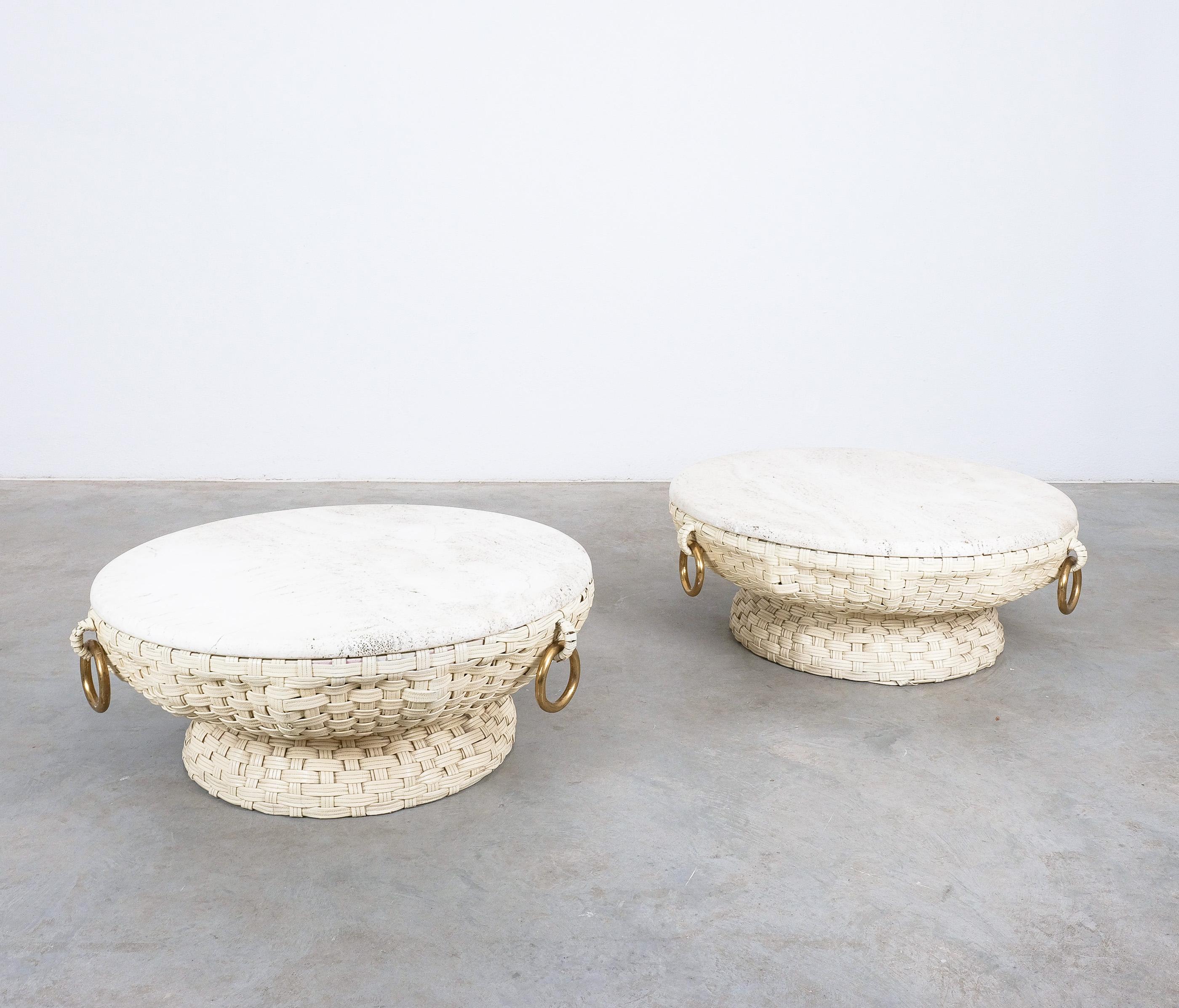 A Pair of Low Coffee Tables with Travertine Top by Marzio Cecchi for Studio Most, 1970s
This is a very rare set of white (cru)  woven leather coffee tables by Marzio Cecchi. Both are identical and well sized with a diameter of 36