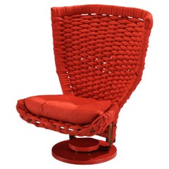 Sedia girevole scultorea di Marzio Cecchi con rivestimento rosso intrecciato
