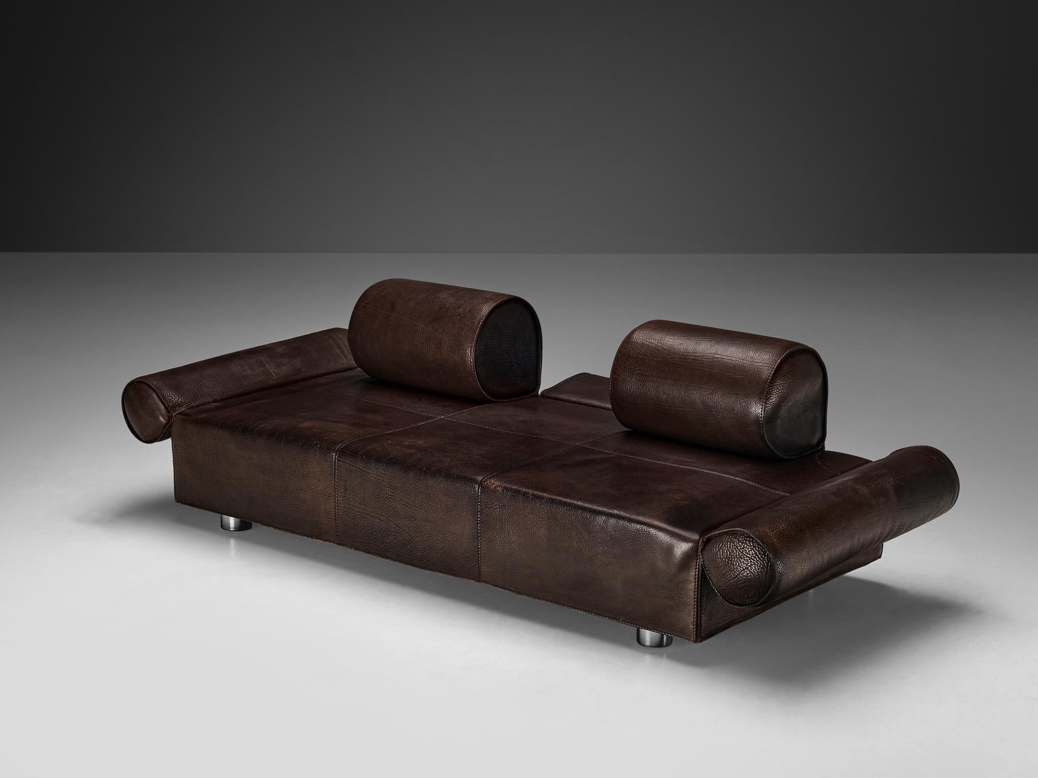 Marzio Cecchi three-seat sofa, buffalo leather, chromed metal, metal, Italy, 1970s

In the dynamic landscape of 1970s furniture design, Marzio Cecchi's three-seat sofa emerges as a masterpiece of form and function. Crafted from luxurious buffalo