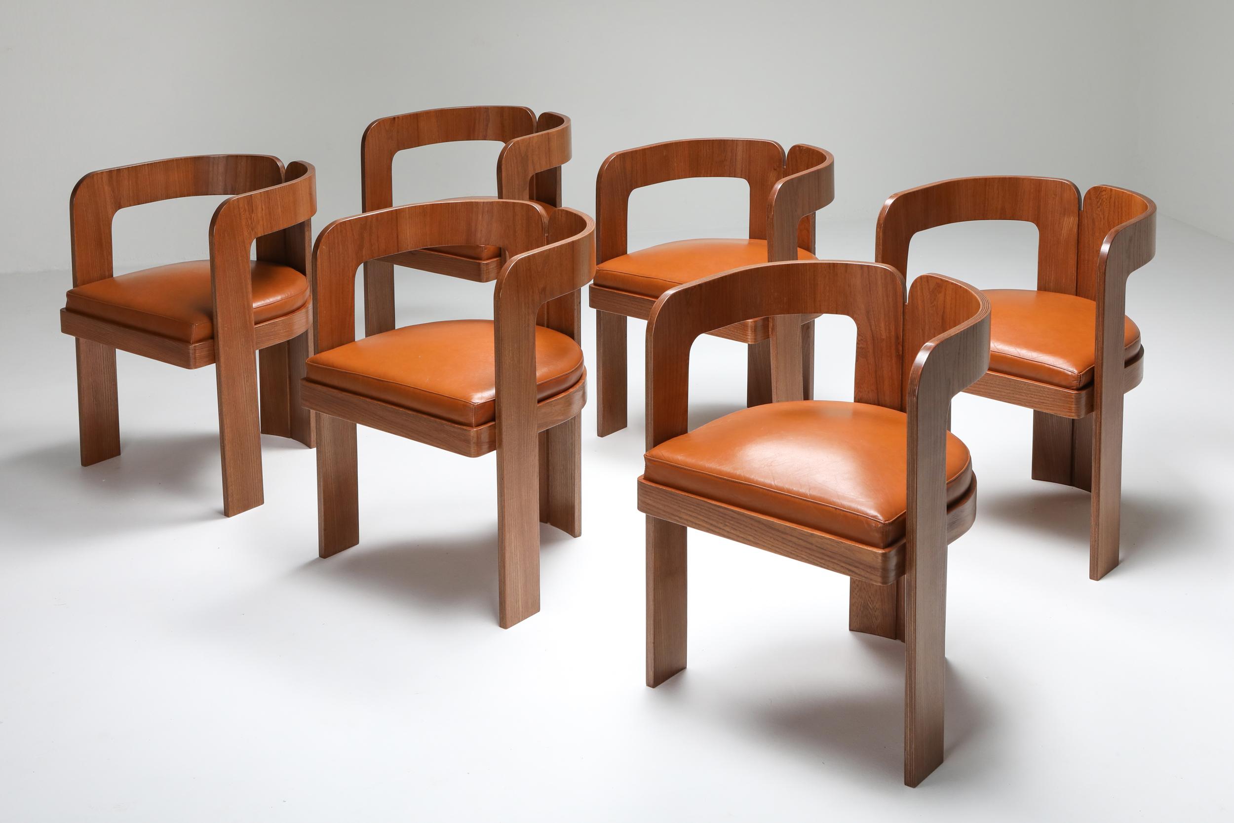 Postmodern dining chairs, by Marzio Cecchi, walnut, cognac leather

Bespoke set of armchair designed for a specific table and project.
Marzio Cecchi was interior designer, architect, furniture designer, and artist.
He made everything custom for