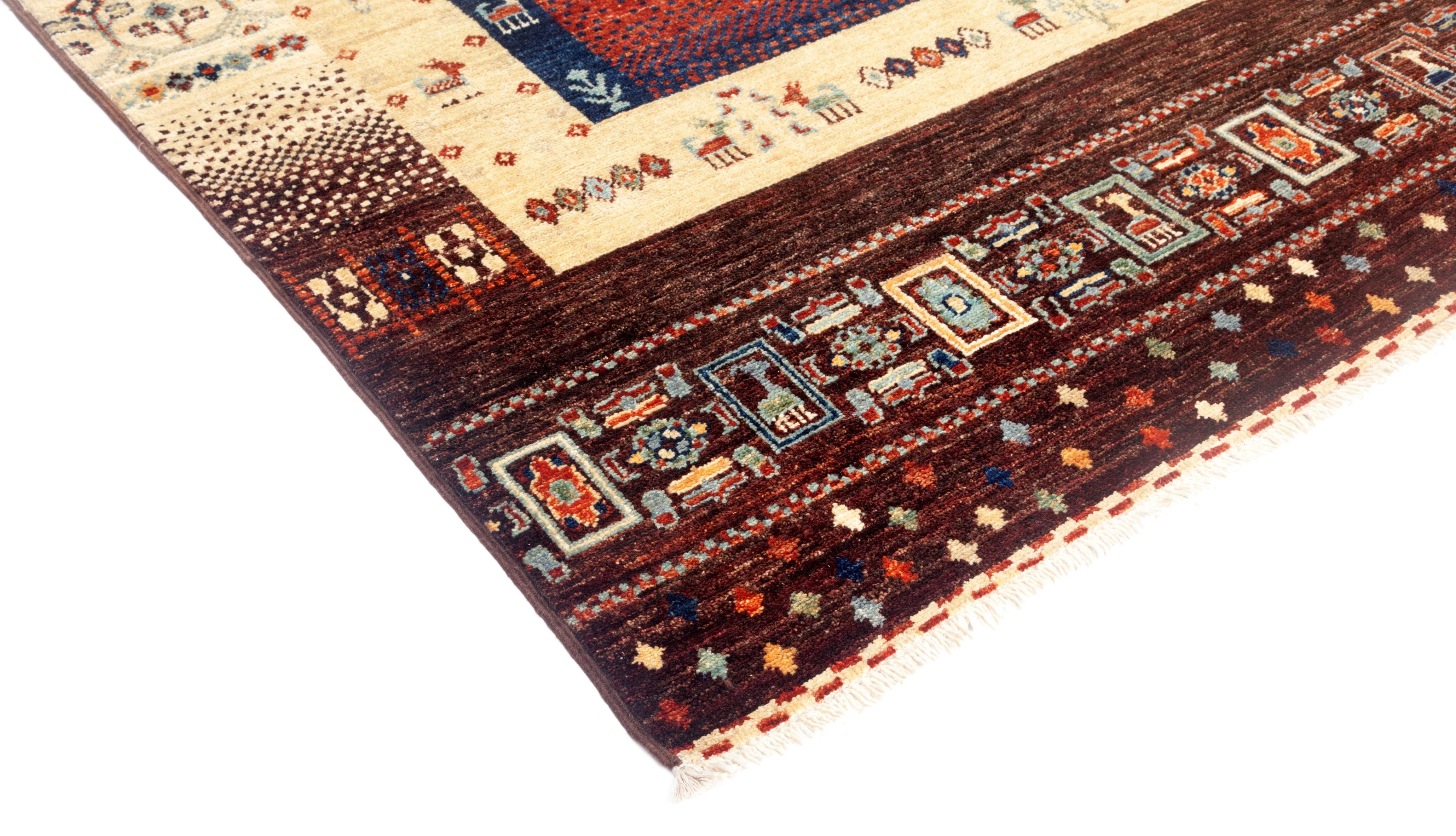 The Tribal area rug collection has two distinct directions. One is extremely colorful, with horizontally striped runners and area rugs whose designs derive from Persian flat-woven textiles. The other vector is based upon Baluchi prayer rugs from
