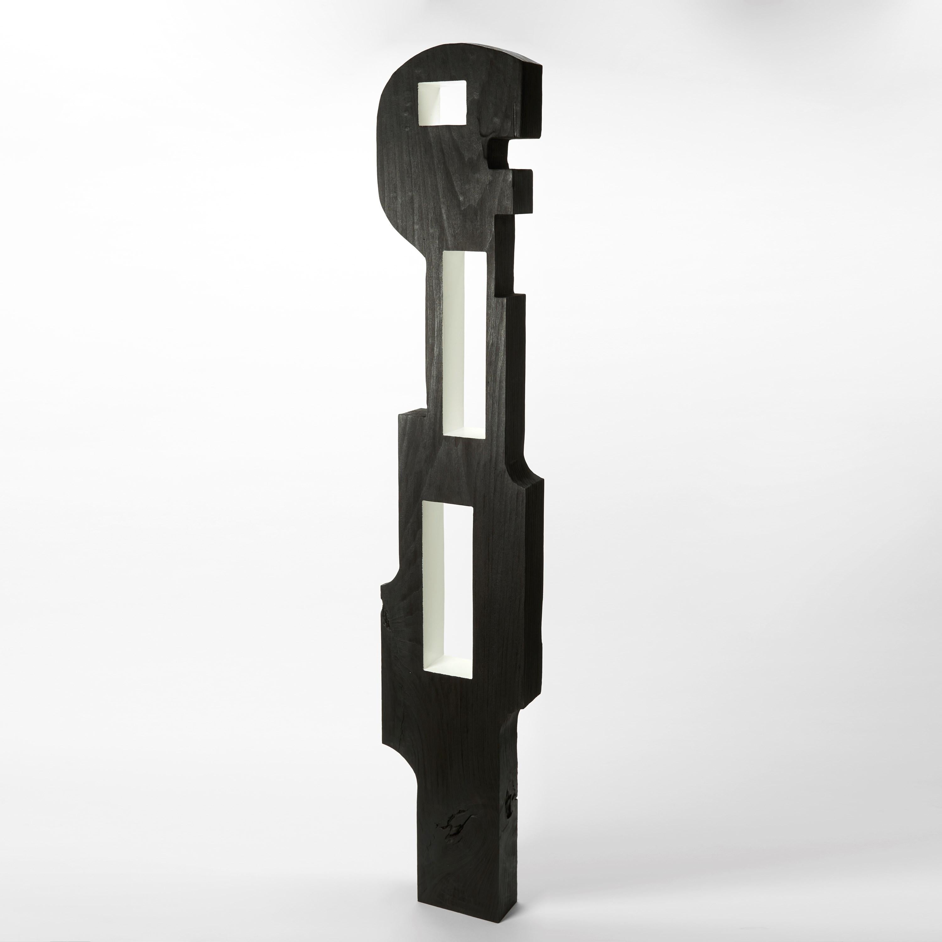 'Masai 0.3' is a unique wooden sculpture by the British artist, Donald Baugh.

Donald Baugh was born in London and from the ages of one to eight lived in Jamaica with his grandparents and two sisters, before returning to his parents in Ealing.