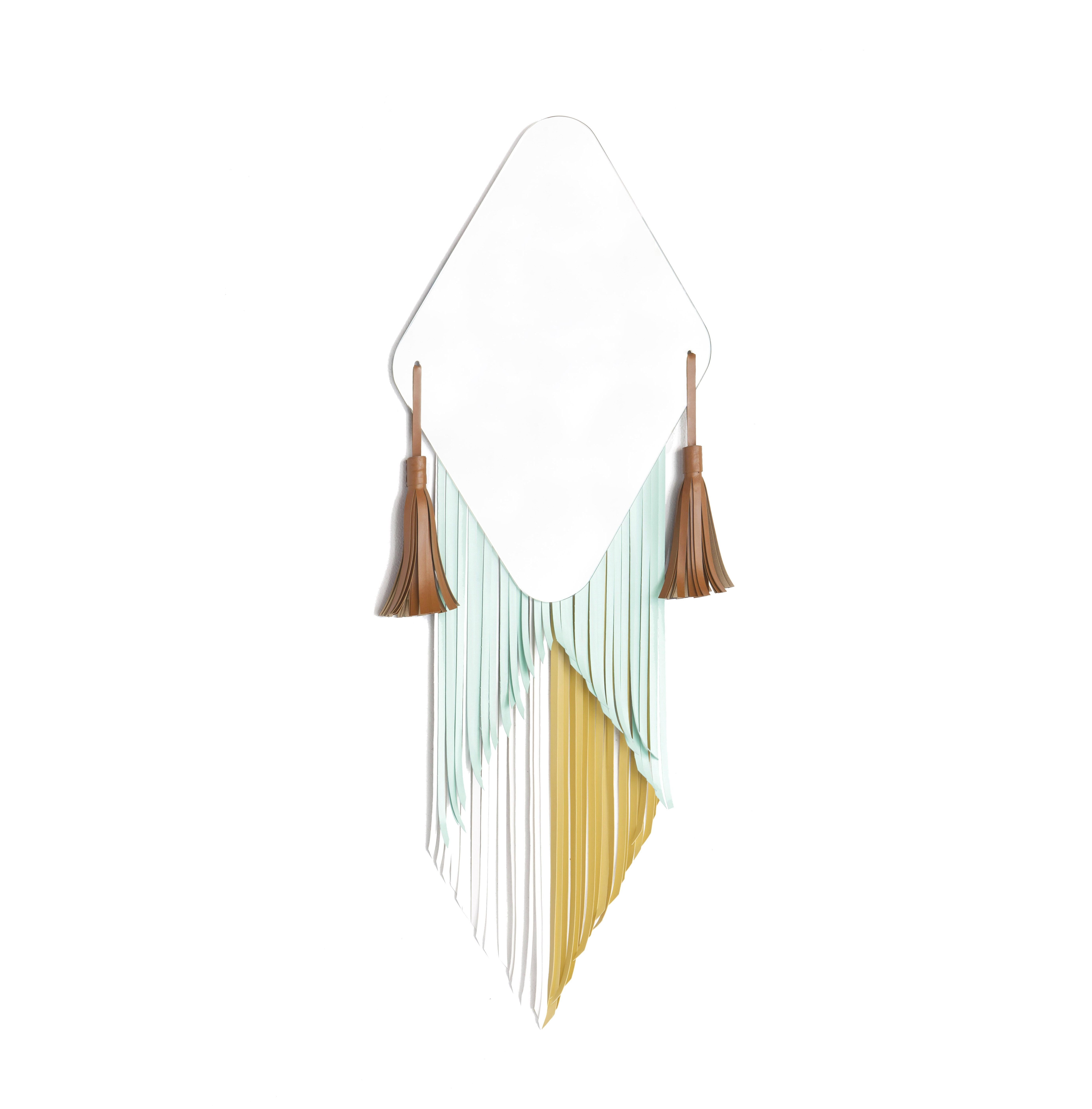 Masai diamond mirror by Serena Confalonieri
Dimensions: 42 x 60 cm
Materials: Mirror, faux leather decorations
Faux leather colors: Water blue, yellow, white and natural brown

Diamond mirror with faux leather decorations.

Serena