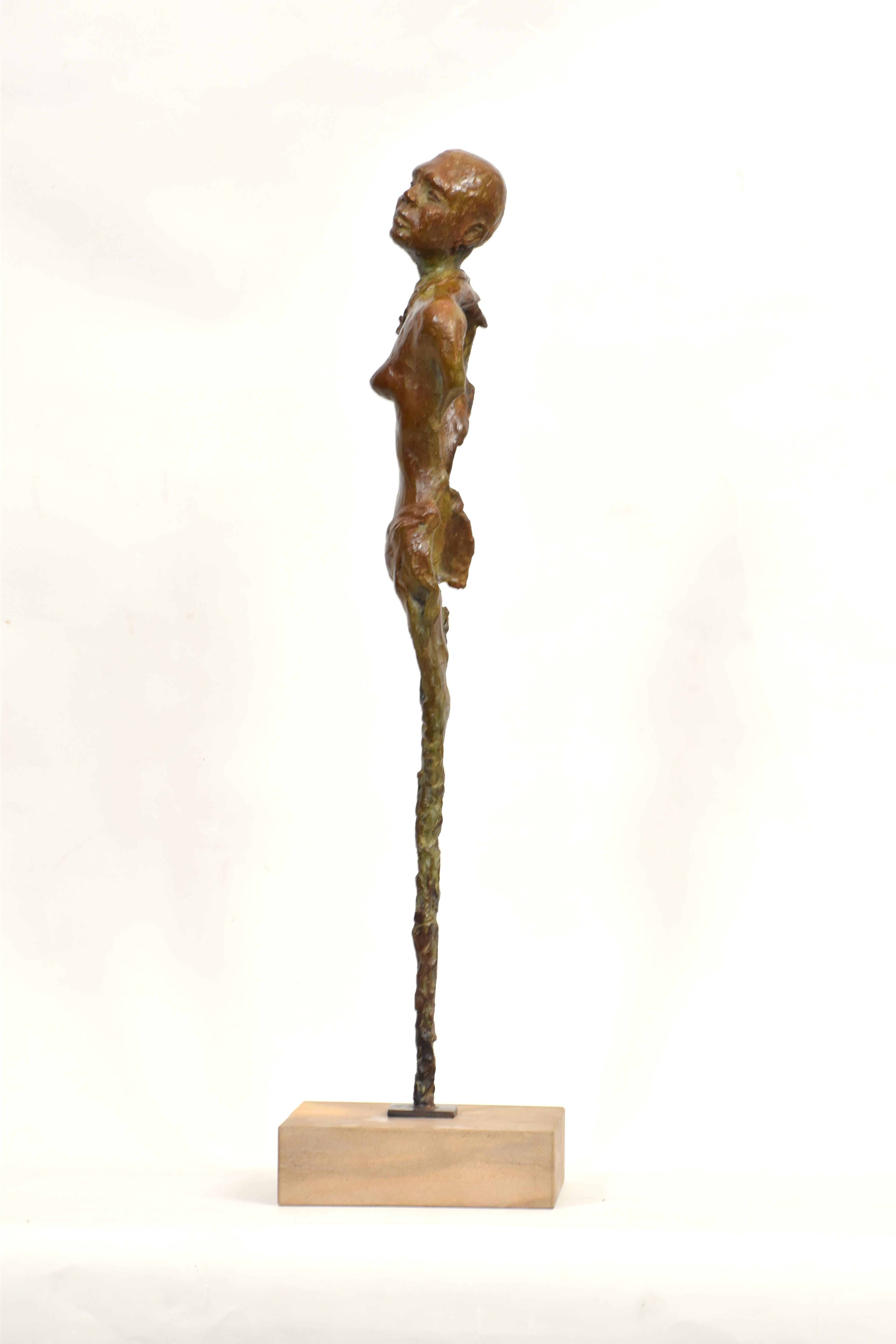 Una ragazza Maasai, una volta raggiunta l'adolescenza, si sottopone a un rito di passaggio tradizionale noto come 