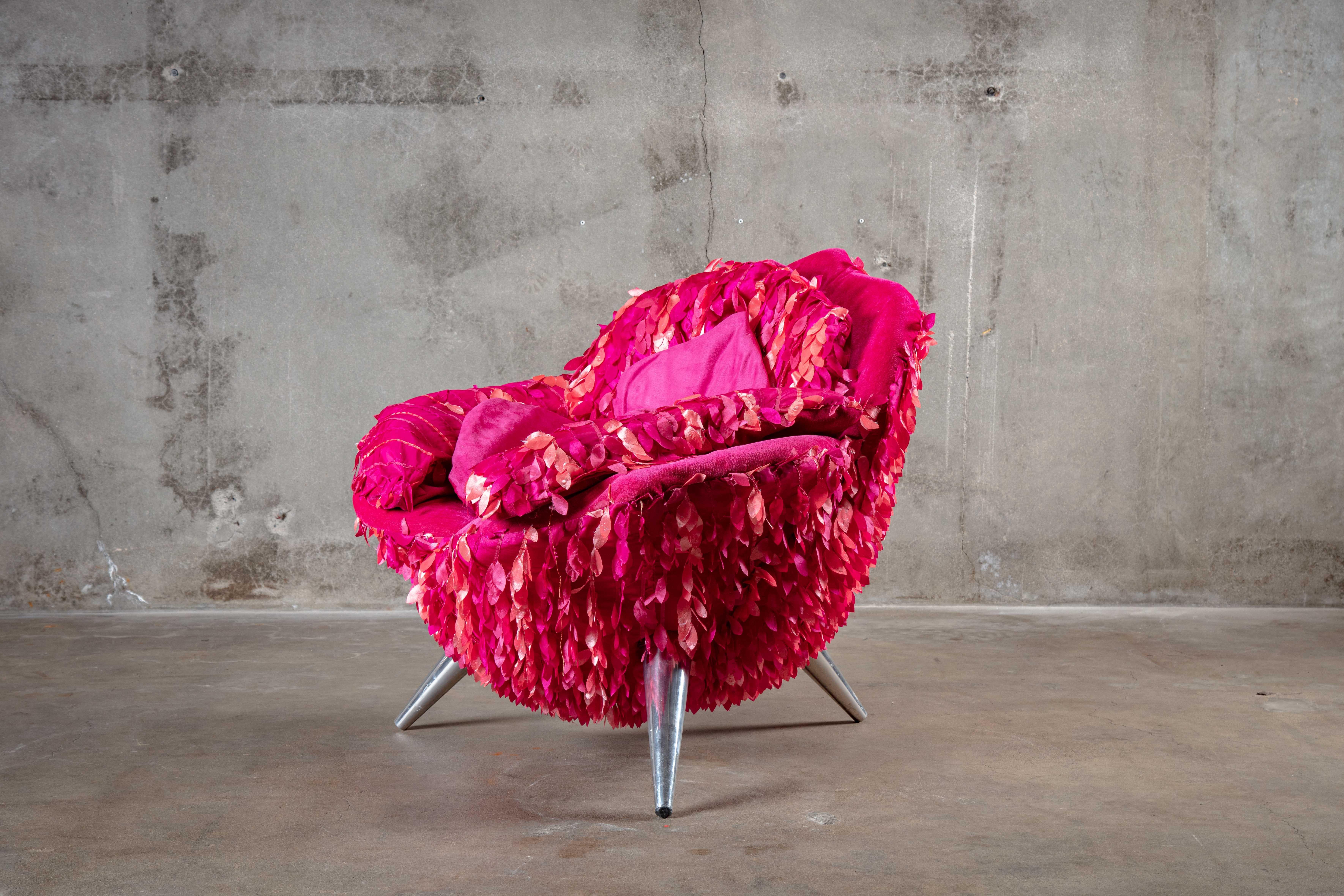 Japan: Masanori Umeda (1941-) floral design chair, designed as an opening flower in pink and red tones.

Measures: Seat height 15 inches

Arm height 19 inches.