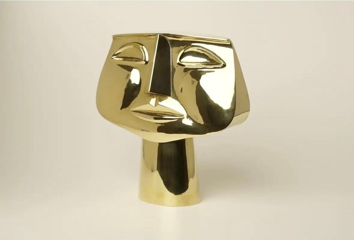 Spanish name: Mascara de Niño, Translation: Child's Head
Handmade polished brass sculpture based off of Oswaldo Guayasamín's 