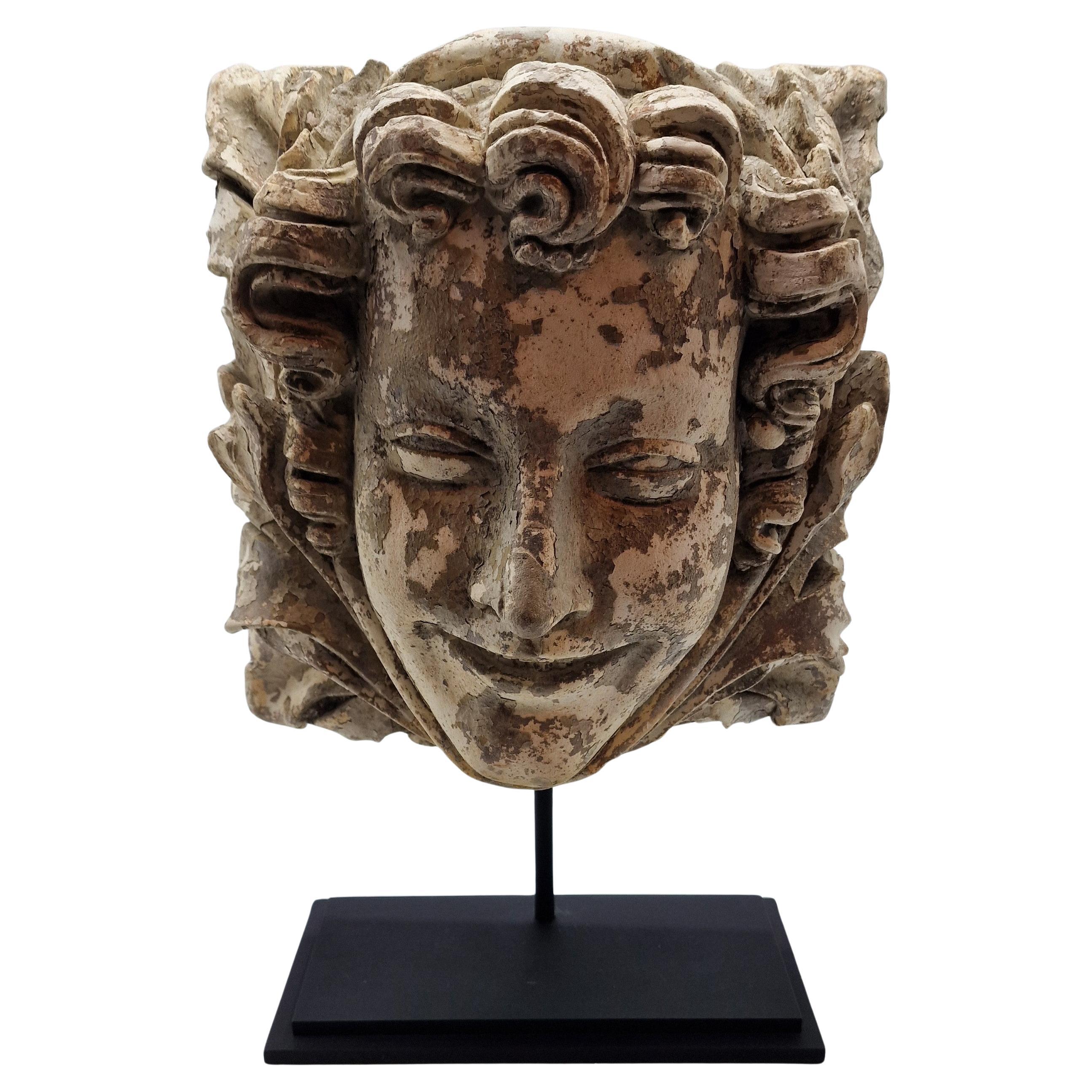 Mascaron à tête de femme