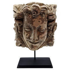 Mascaron à tête de femme