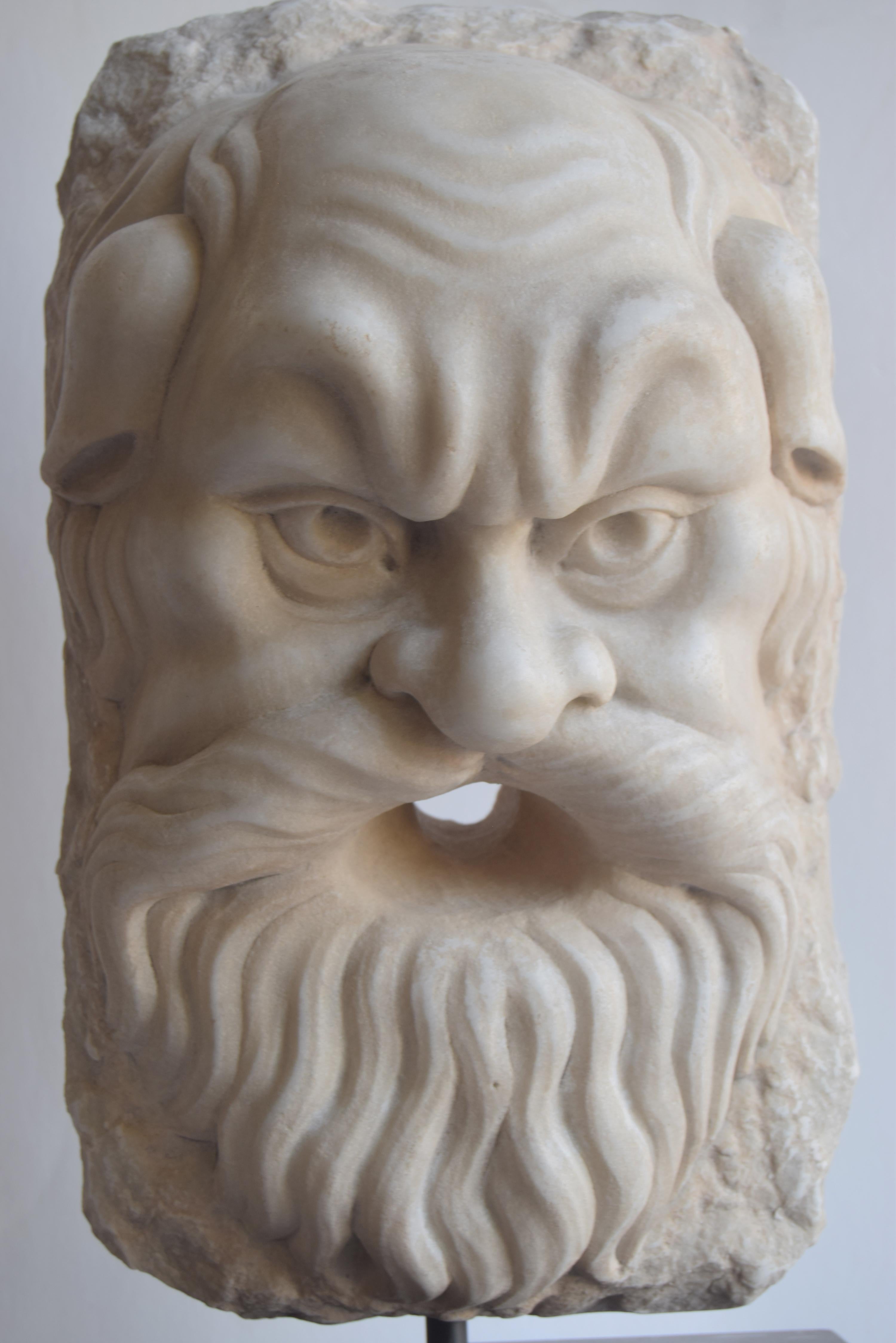 Sculpture, Marble, Satyr, classical sculpture, made in Italy, ancient theater mask.
Theatrical mask of satyr carved on white Carrara marble placed on a base of fine red Levanzo marble.
These types of masks adorned Greek and later Roman theaters.
The