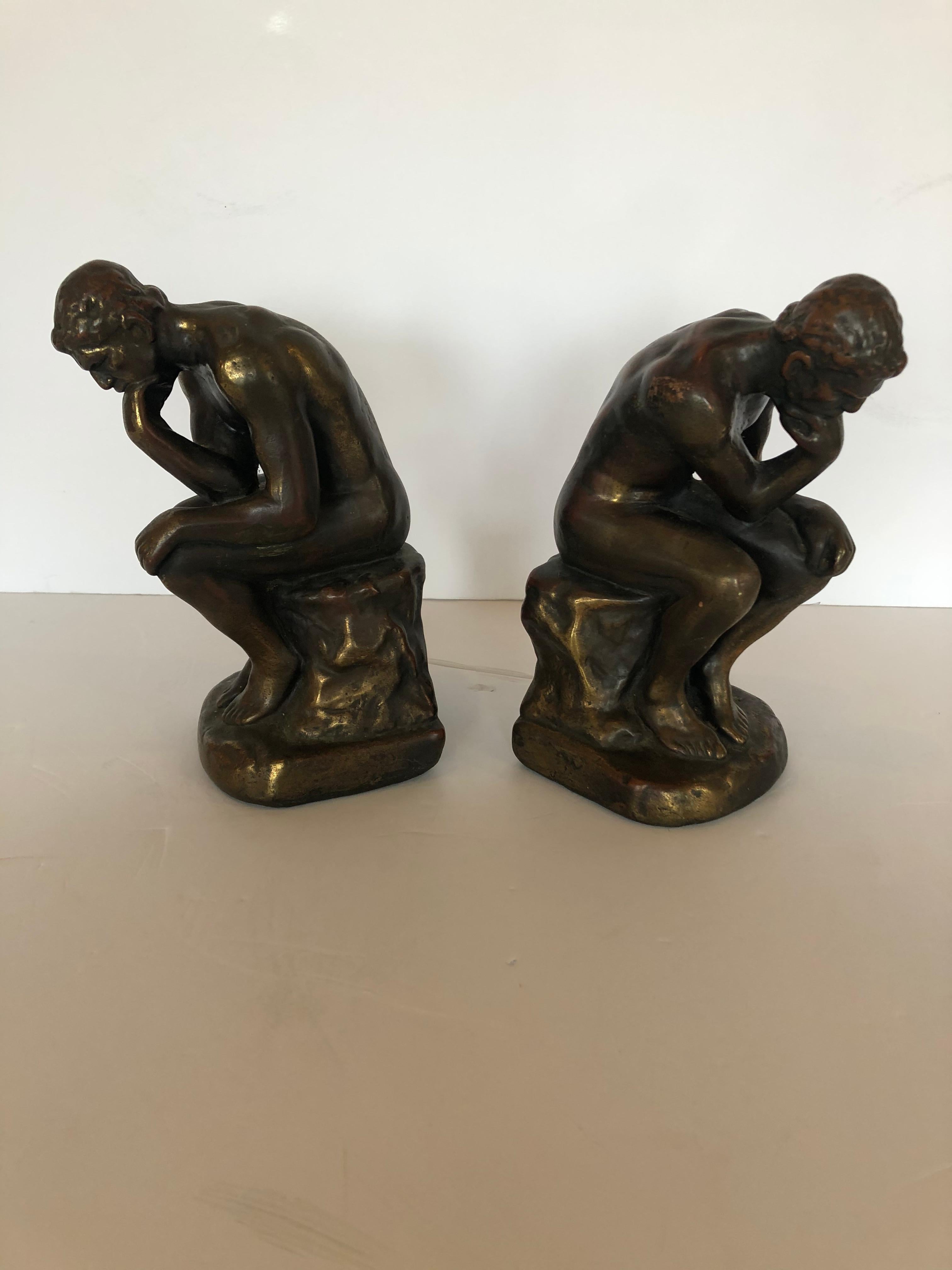 A handsome bronze clad pair of bookends in the shape of muscular male nude thinkers.
No signature.