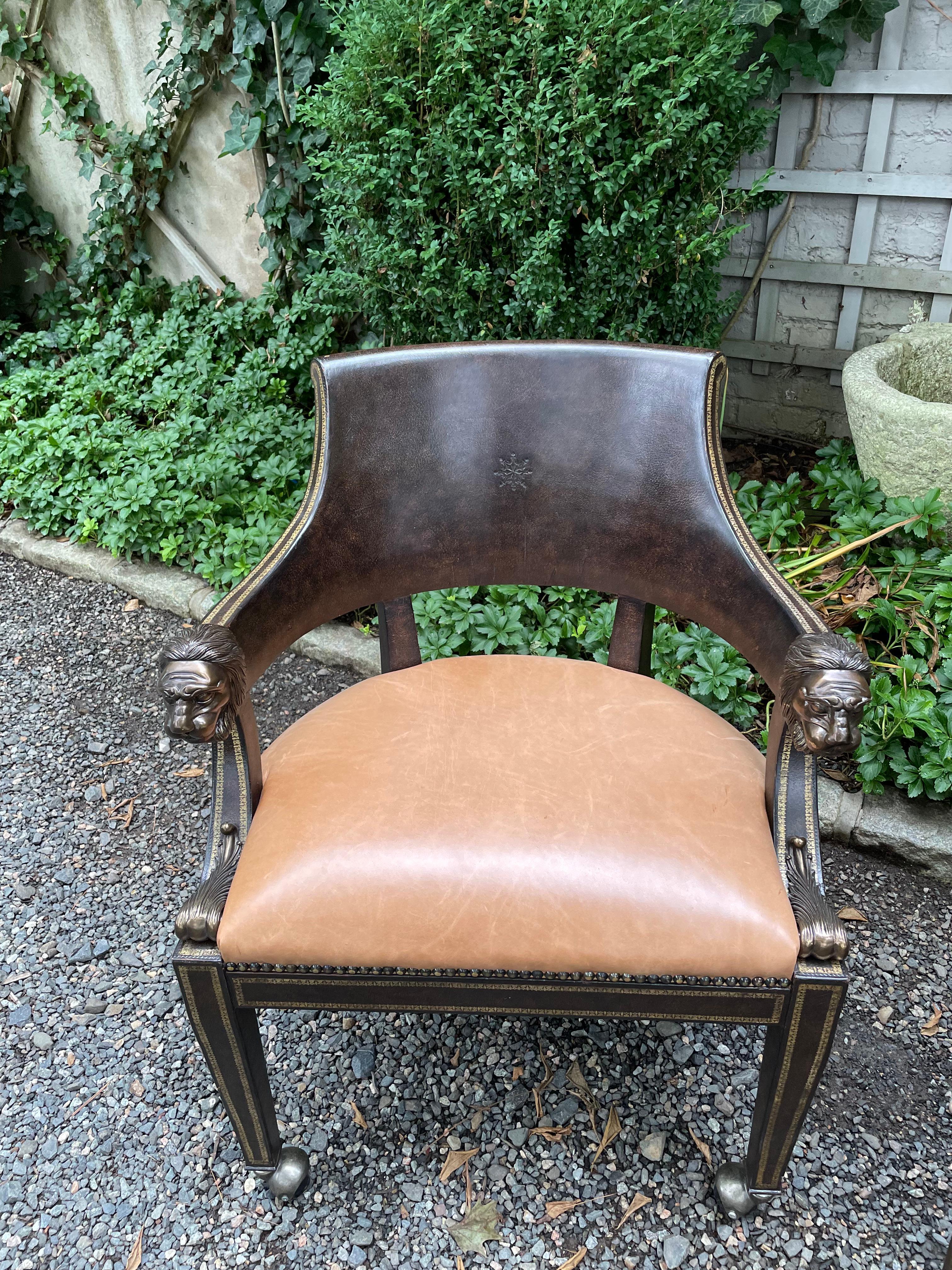 Masculine Pair of Leather Embossed Armchairs with Bronze Lion Arm Rests 4