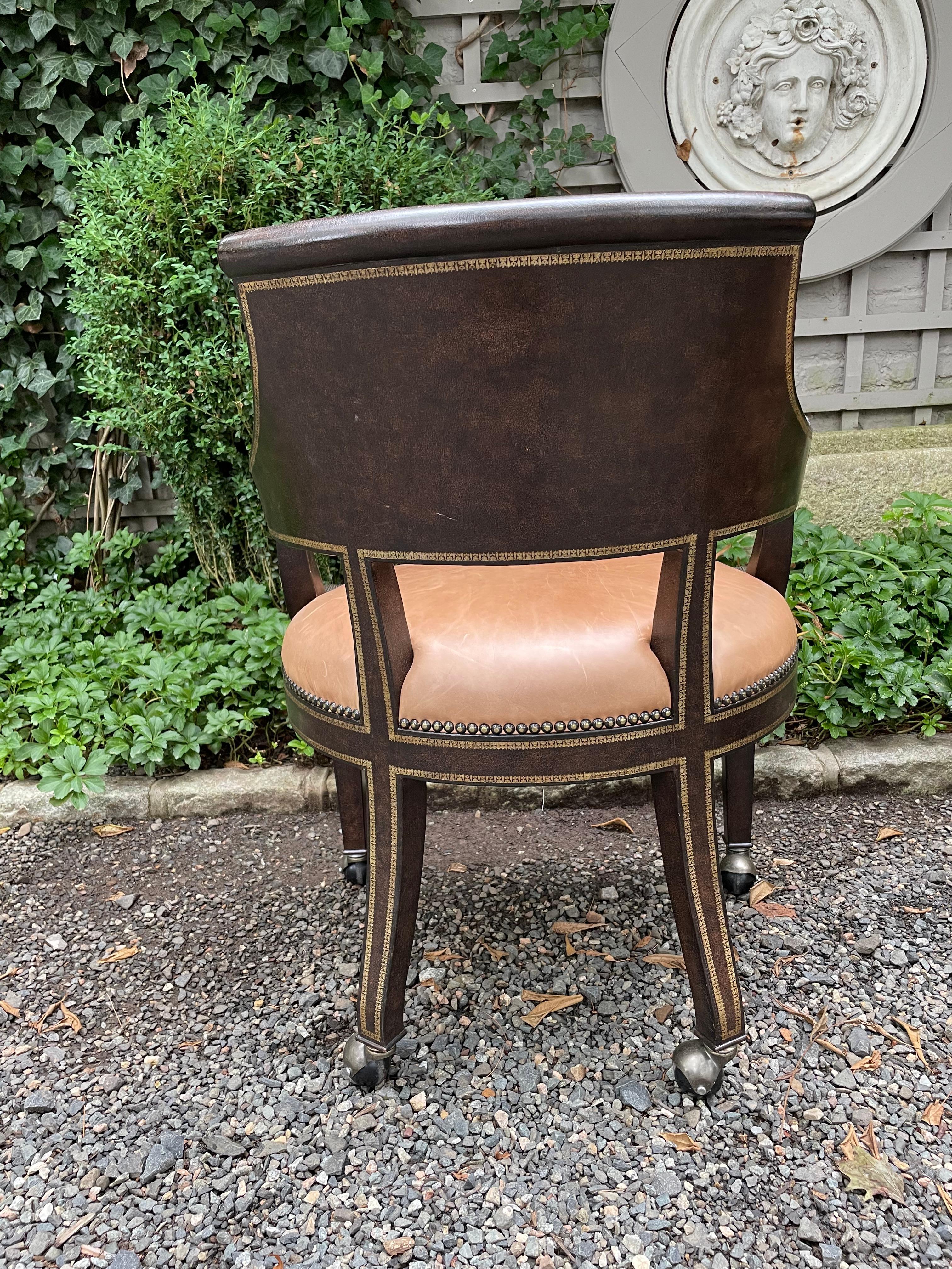 Contemporary Masculine Pair of Leather Embossed Armchairs with Bronze Lion Arm Rests