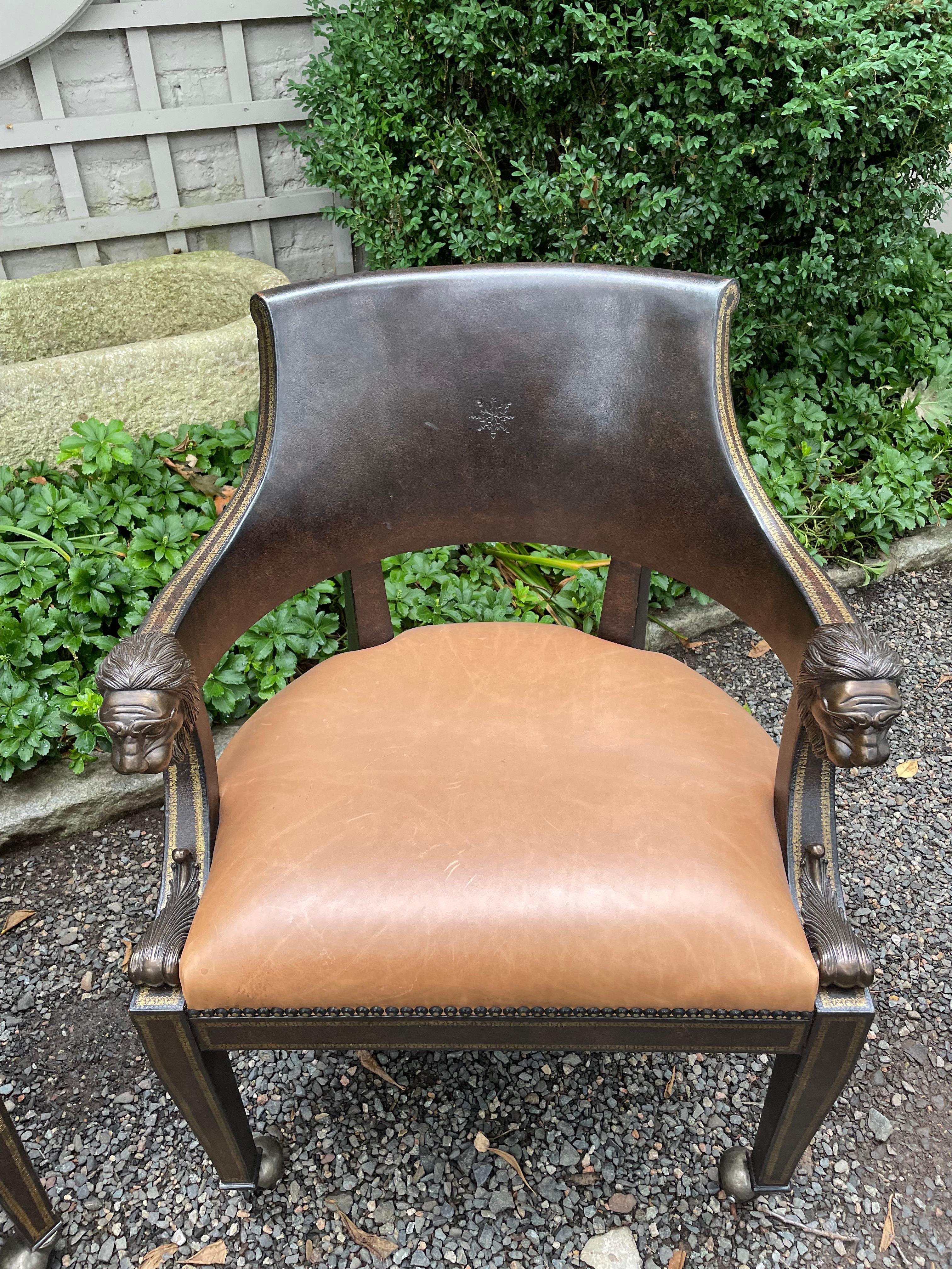 Masculine Pair of Leather Embossed Armchairs with Bronze Lion Arm Rests 3