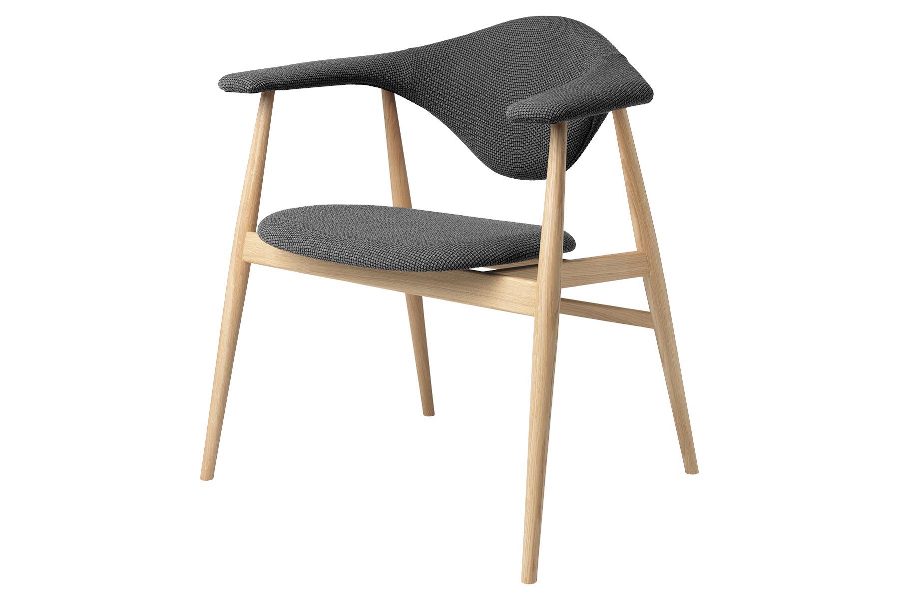 The Masculo chair by GamFratesi marries the idea of Danish elegance and simplicity with Italian refinement and playfulness. The backrest of Masculo is almost overly large, which call to mind a bull, and appears to float in the air and challenges all