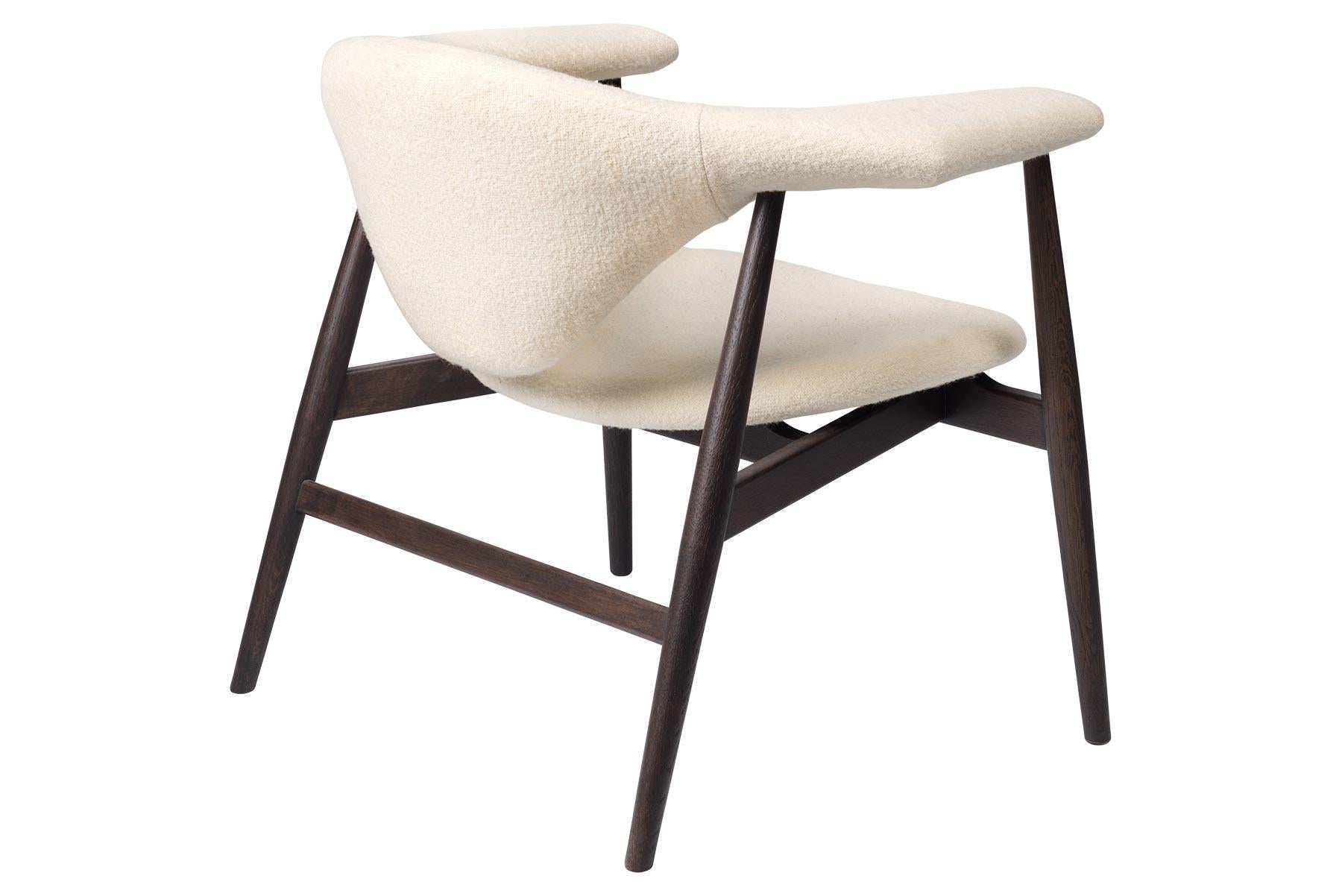 Danish Masculo Lounge Chair, Wood Base For Sale