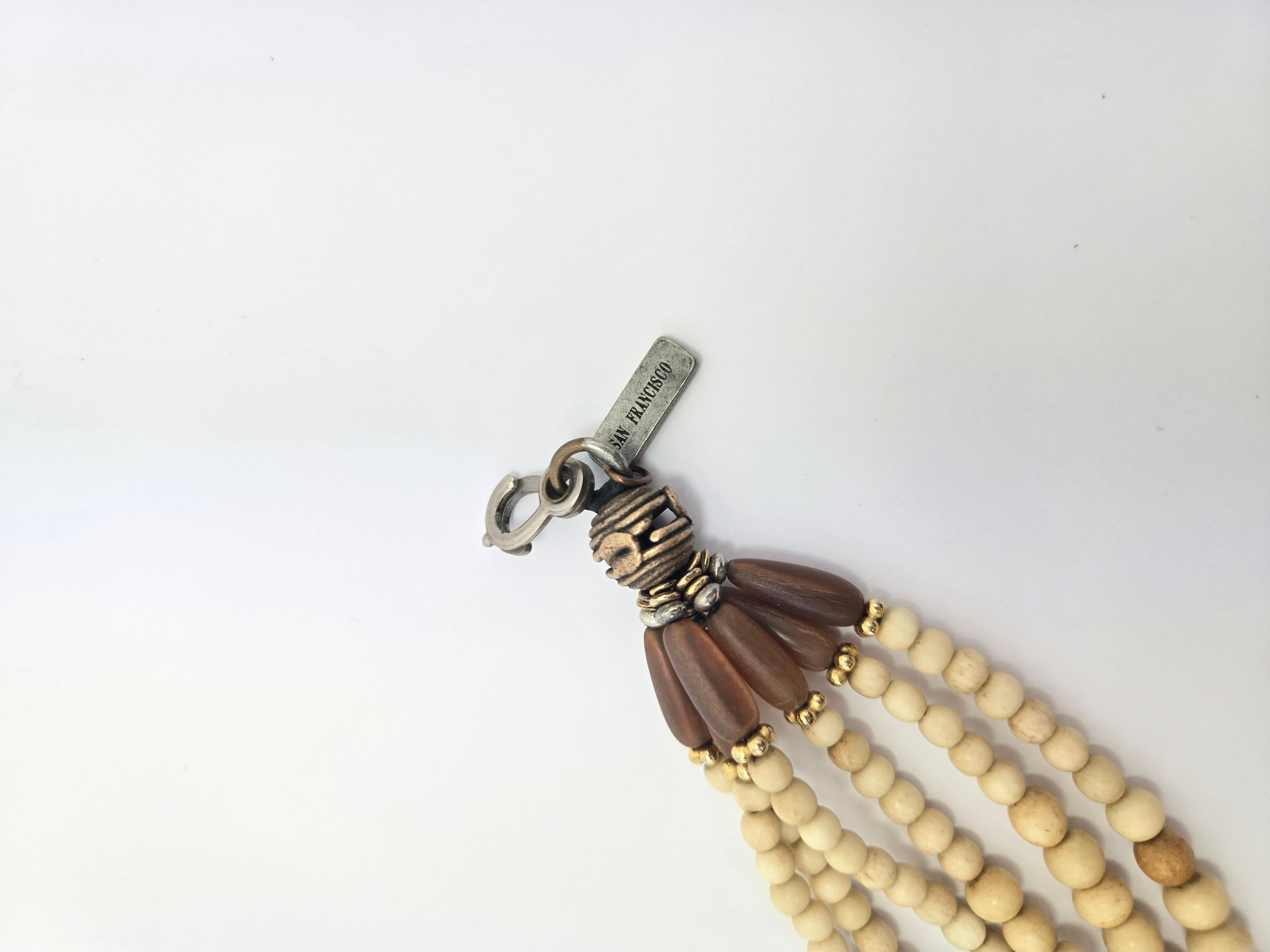 Masha Archer Multi-Strand Bone Beaded Bracelet

Features 6 strands of bone beads measuring 10