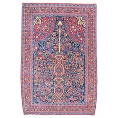 Antique Mashad rug