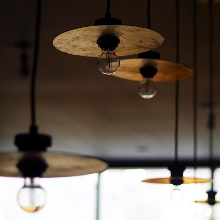 Ma'shar Gilded Gold Pendant Light With Black Cord For Sale at 1stDibs