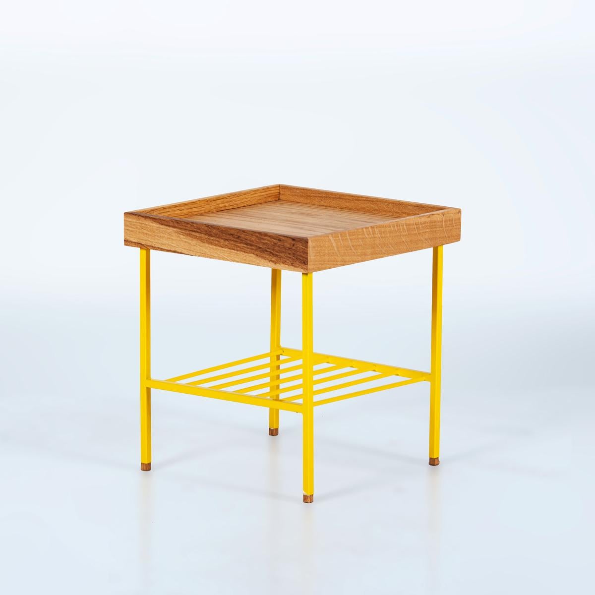 The EDGE Series solid wood short side table / plant stand is a compact and elegant piece designed for modern living. Handcrafted from 100% solid oak, it showcases the natural grain, texture, and warm tone of the wood, making each piece truly