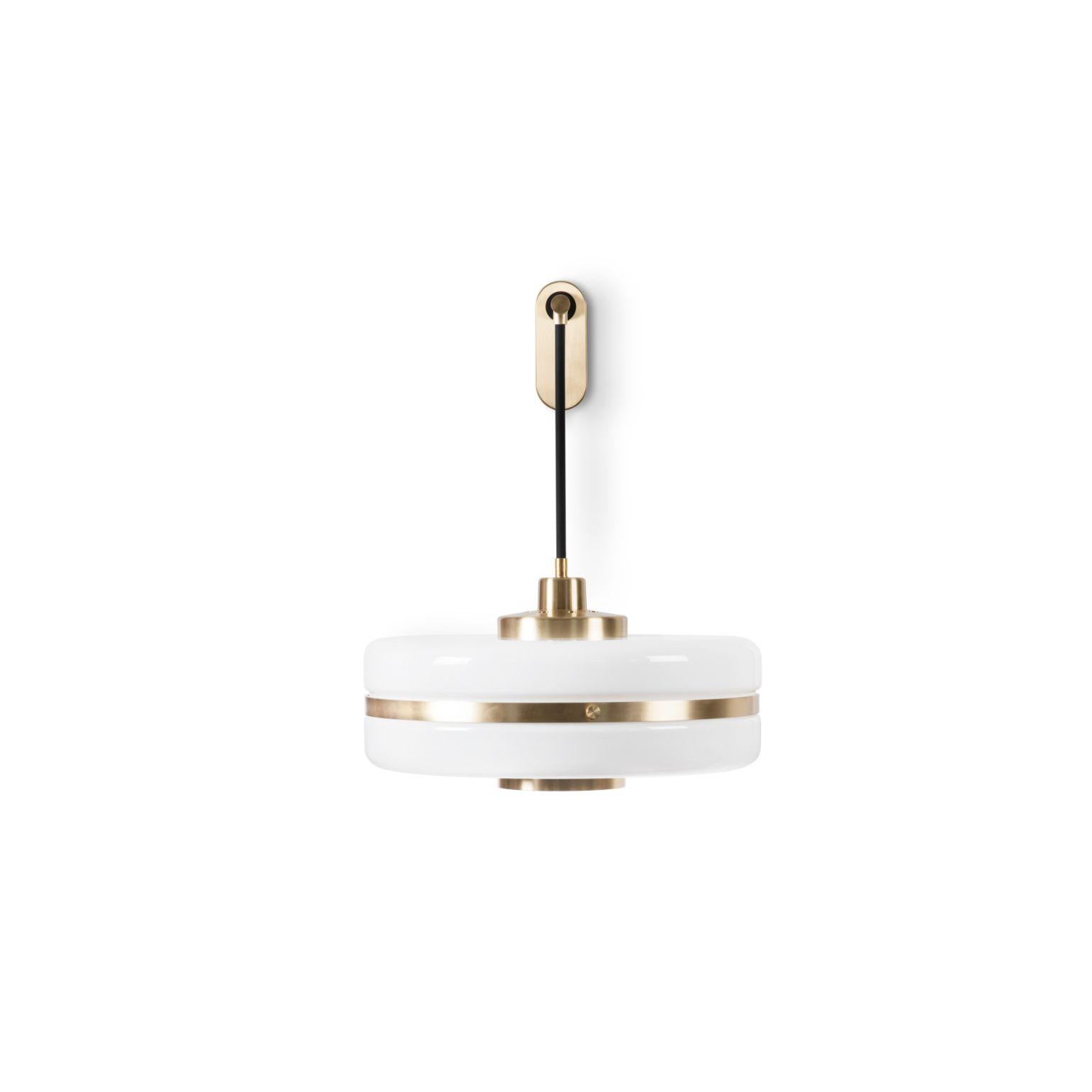 Masina wall light by Bert Frank
Dimensions: 53.5 x 56.4 x 40 cm
Materials: Brass, glass

When Adam Yeats and Robbie Llewellyn founded Bert Frank in 2013 it was a meeting of minds and the start of a collaborative creative partnership with engineering