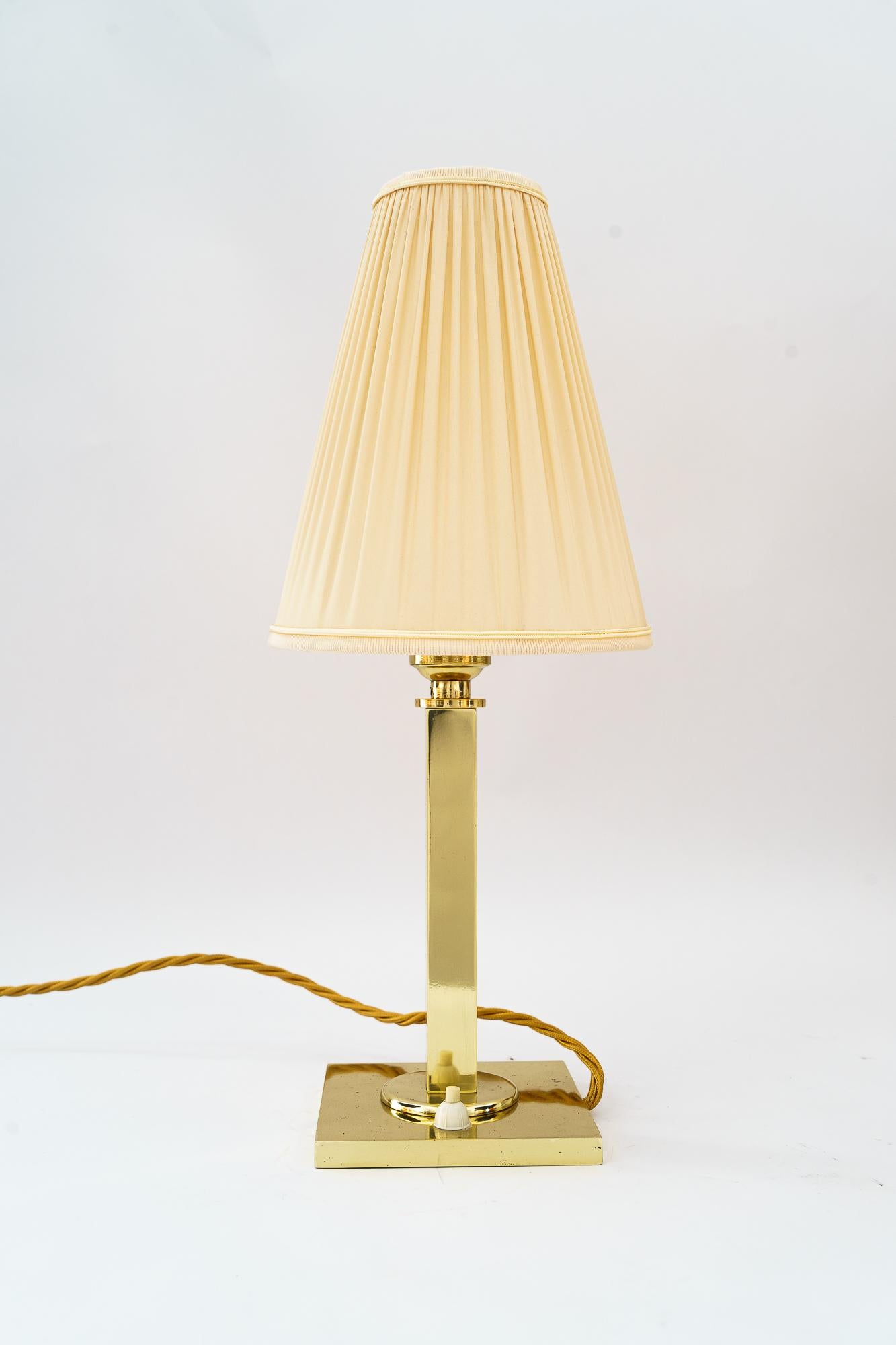 Masive Art Deco Table Lamp with fabric shade vienna around 1920s
Polished and stove enameled
The fabric shade is replaced ( new )