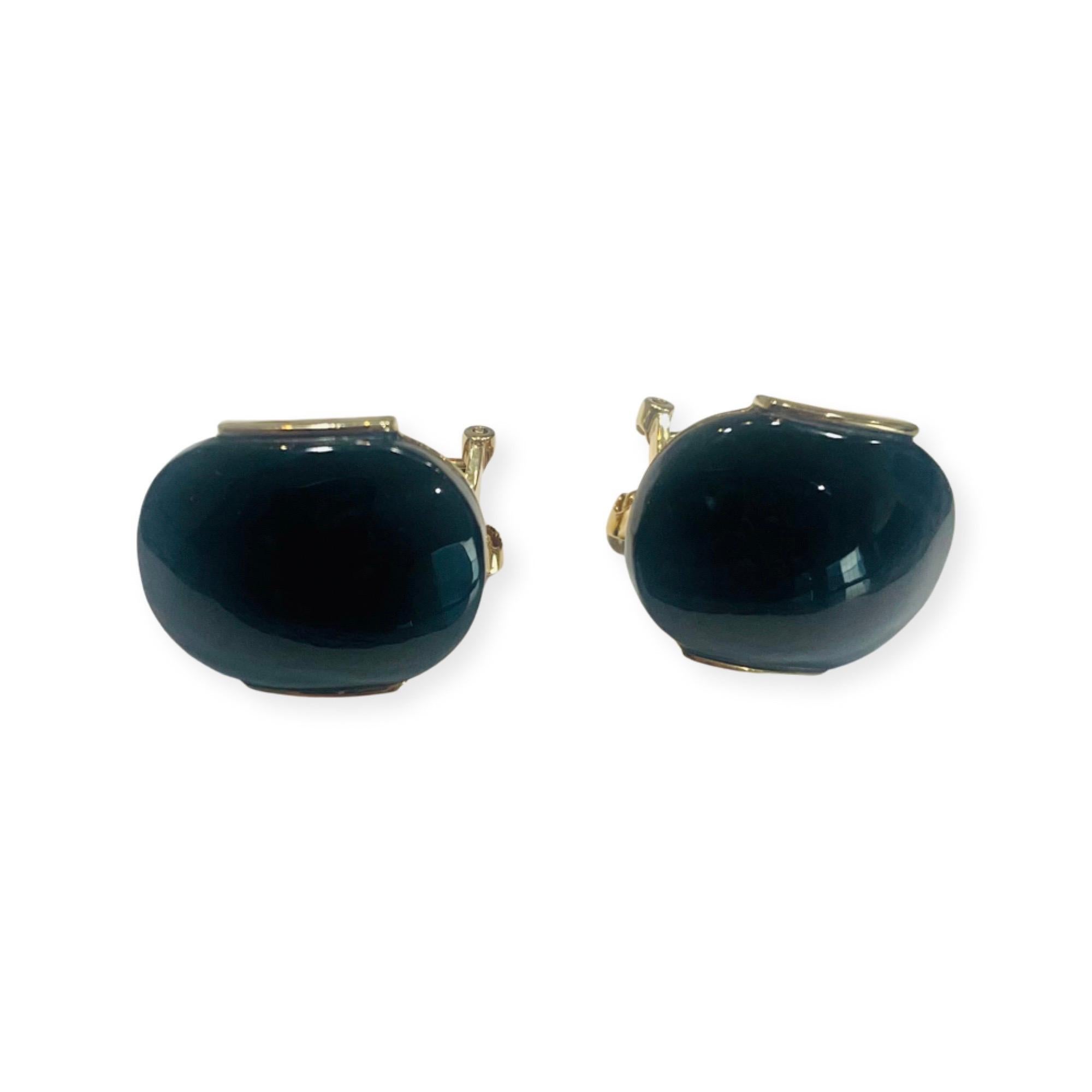 Mason Kay 18K Yellow Gold Natural Black Jade Earrings. There are 2 - 19.5 mm x 15.25 mm black jade saddles,  channel set. The earrings have omega backs. 
400-70-331