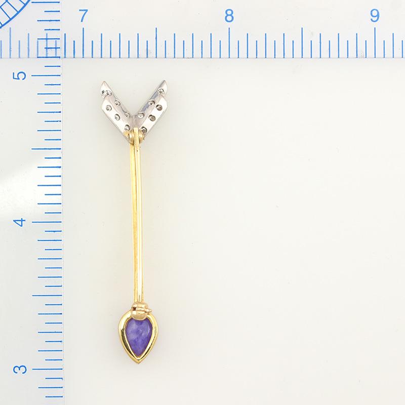 A Mason-Kay Original One-of-a-kind Design. Certified natural intense lavender jadeite pear shaped cabochon (6x8mm) set in an 18K yellow gold arrow designed pin with pave diamond striping. The total diamond weight is .20cts.  

*** Mason-Kay Jade
