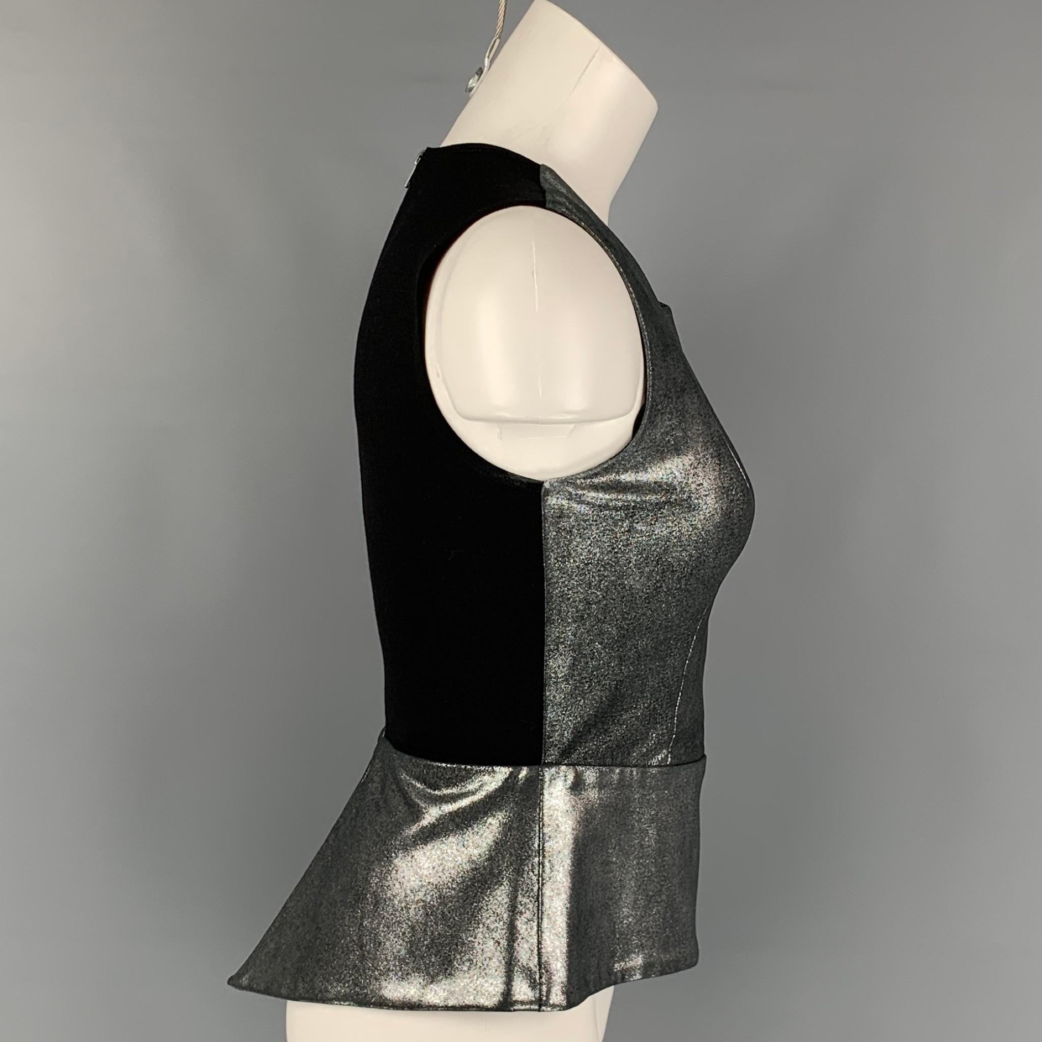 MASON x BARNEY'S NEW YORK casual top comes in a silver lambskin leather with a black rayon blend back featuring a peplum style and a back zipper closure. Made in USA. 

Very Good Pre-Owned Condition.
Marked: 0

Measurements:

Shoulder: 13 in.
Bust: