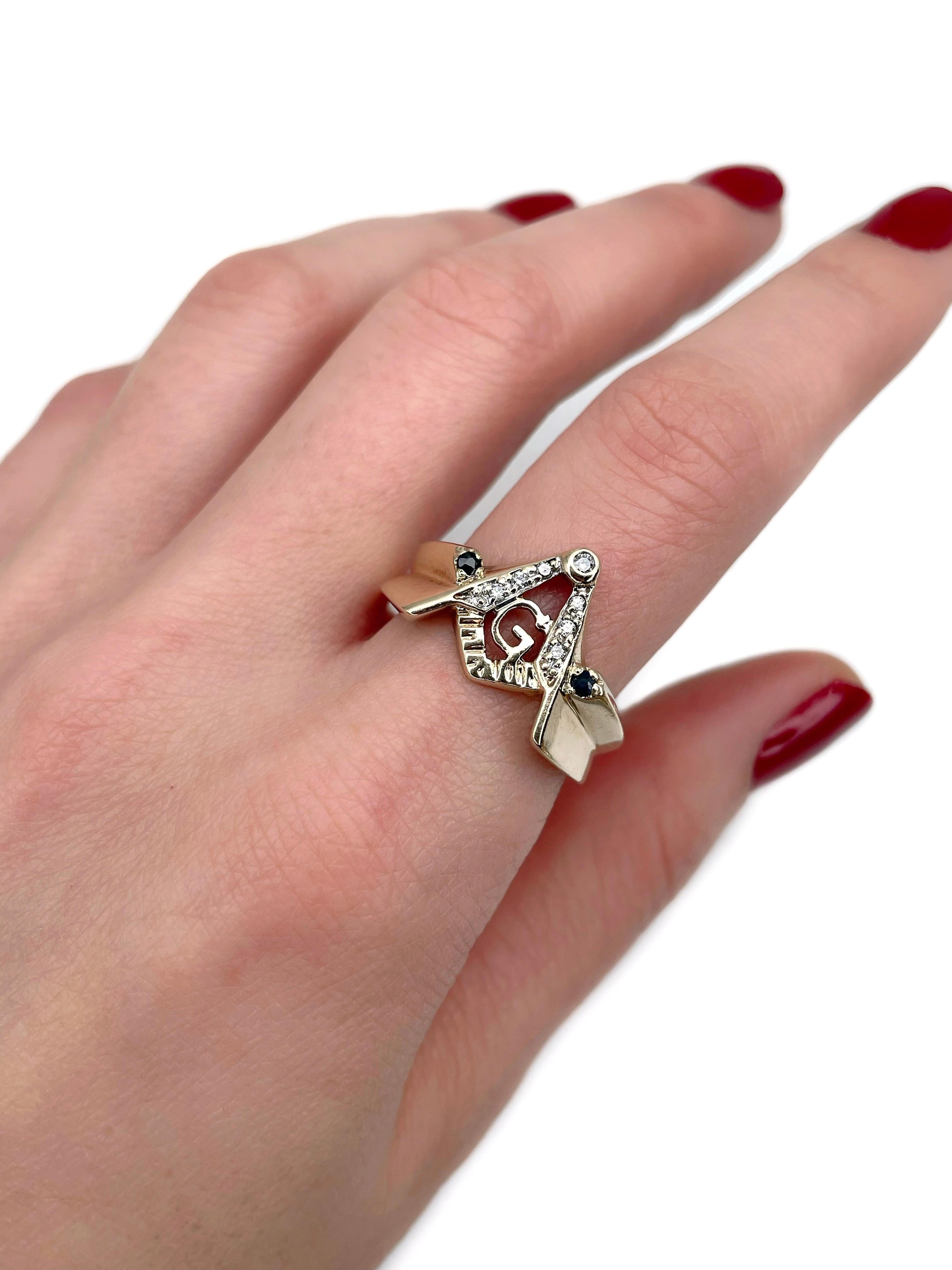 This is a masonic ring crafted in 10K yellow gold. Circa 1960. 

The piece features masonic symbols of the square and compasses adorned with diamonds and sapphires. 

Hallmarked with “10K”, “LES 0963/1500”

Weight: 4.67g
Size: 20.75