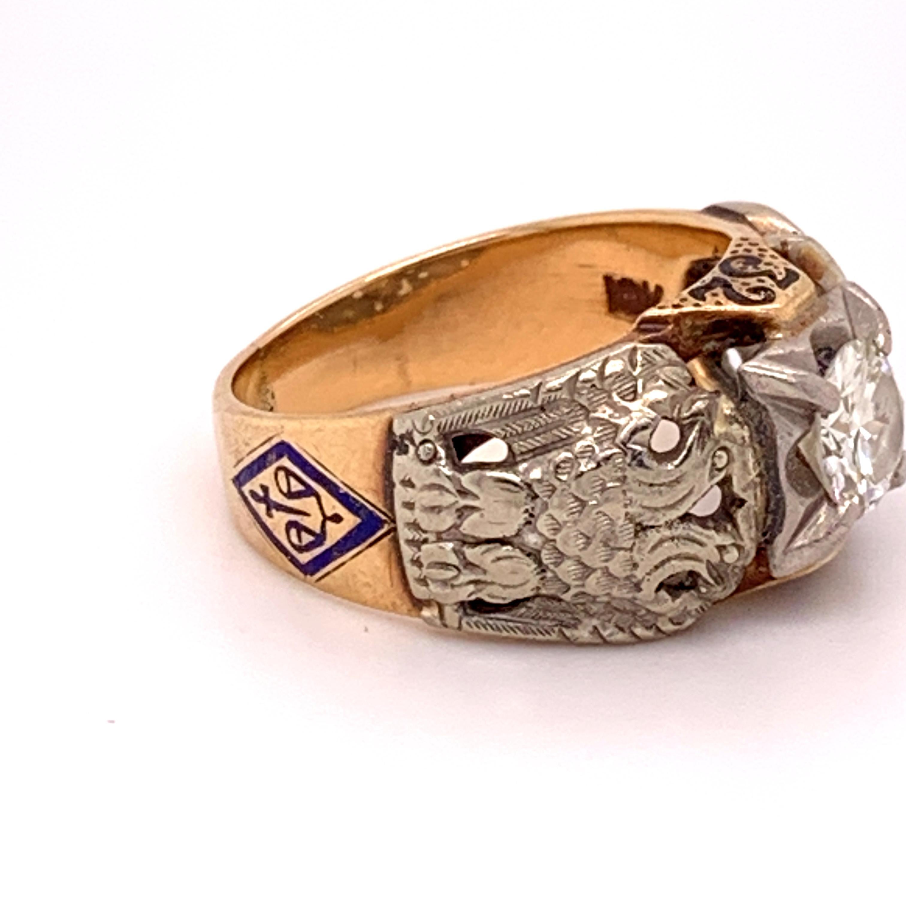 Masonic 10k Yellow Gold Men's Ring .85ct Genuine Natural Diamond Eagle (#J4838)

10k yellow gold Masonic ring with applied white gold featuring a round brilliant cut diamond weighing about .85cts and measuring about 6mm. The diamond has GH color and