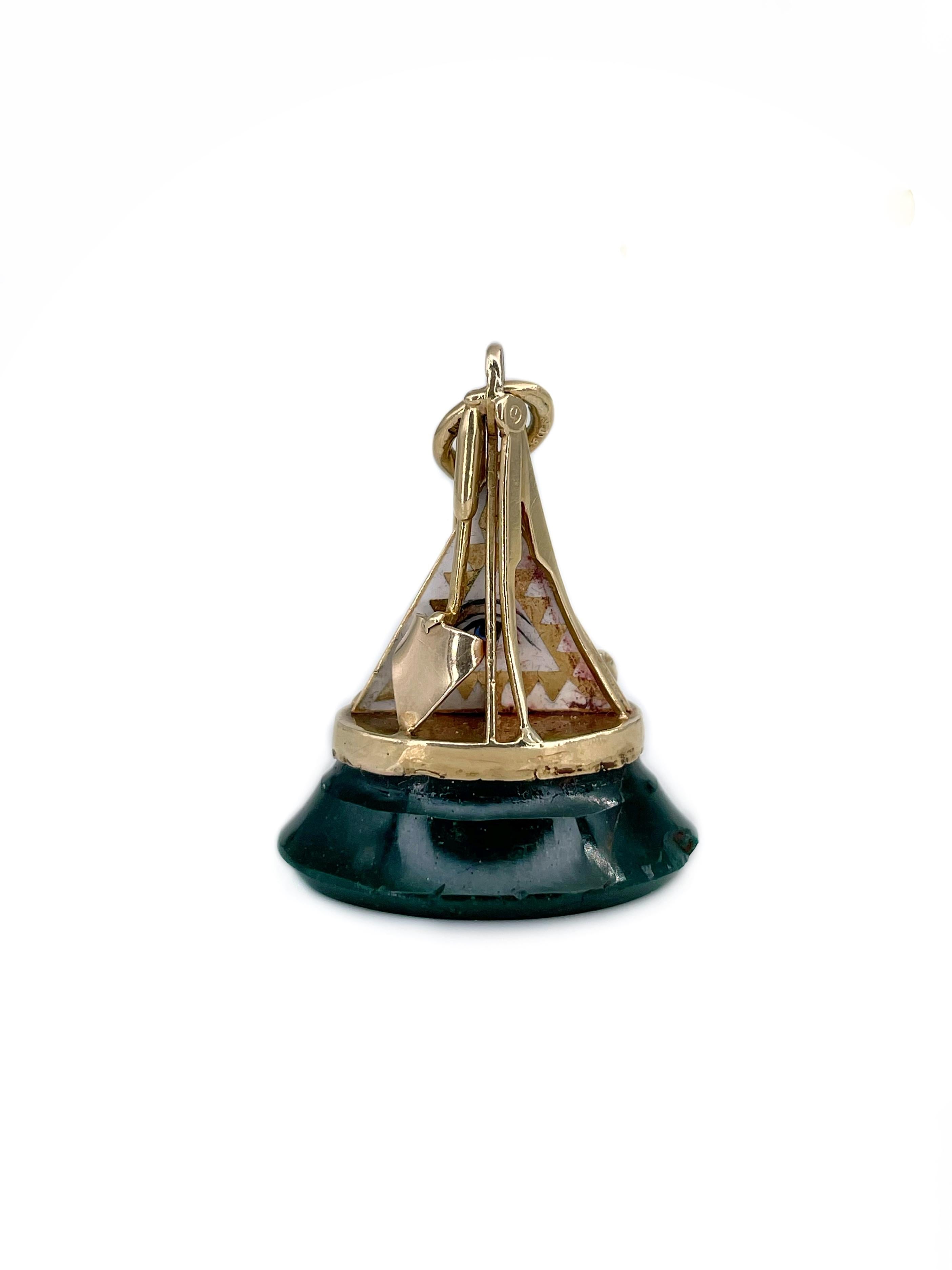 This is a Masonic fob seal pendant crafted in 18K gold. It depicts the symbols of Freemasonry: square, compasses, gavel, trowel and the all seeing eye. The piece features oval heliotrope (also known as bloodstone) - one edge has a minor damage.